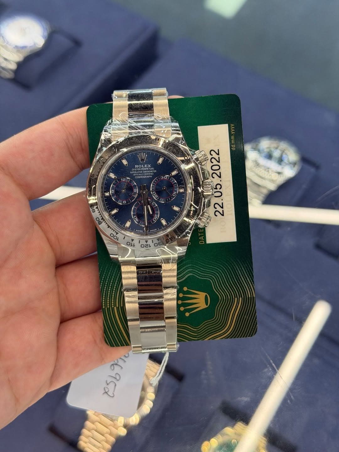 May be an image of wrist watch and text that says 'ROLEX 種 US. .2022 22. OOL '