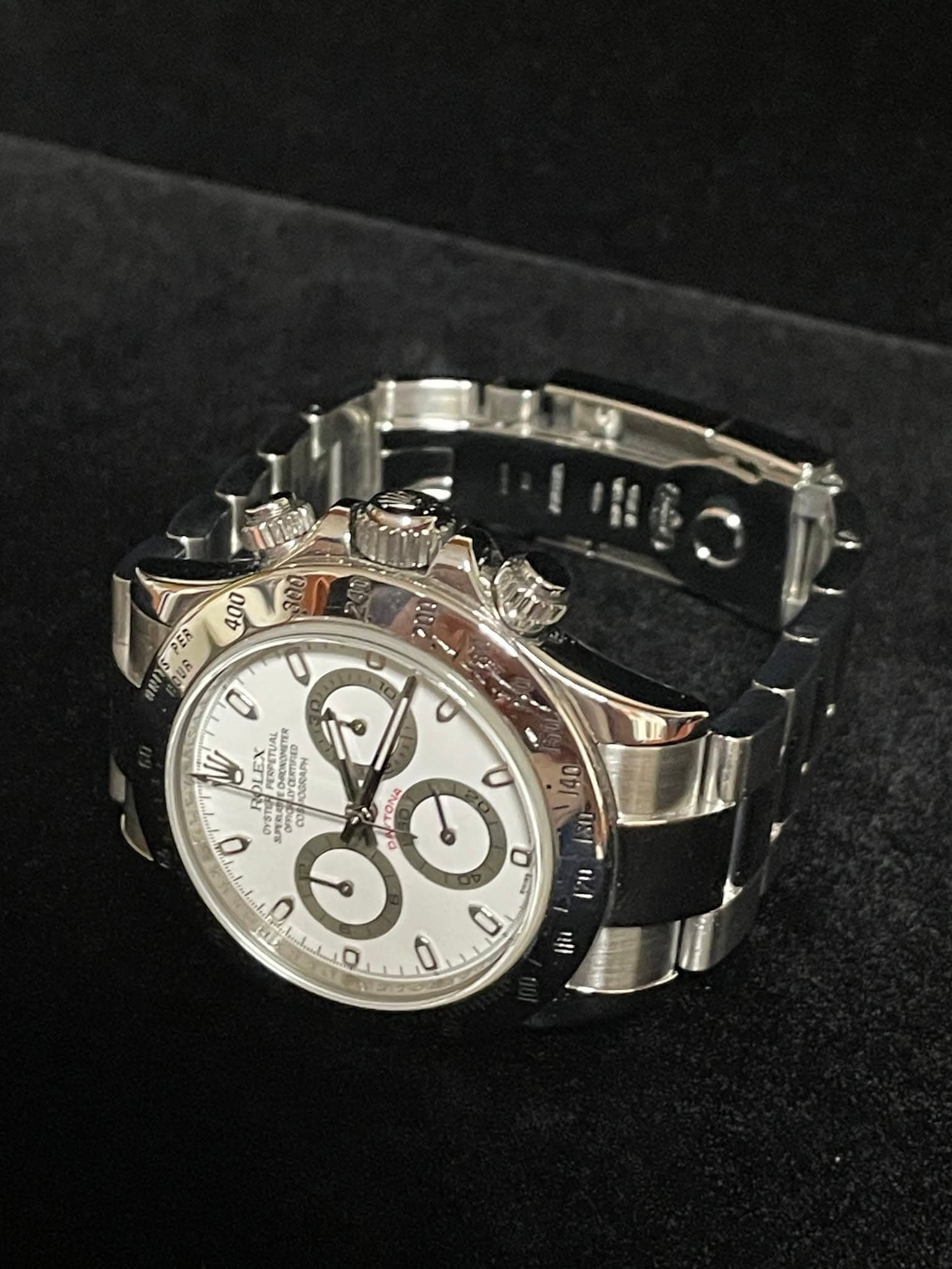 May be an image of wrist watch and text