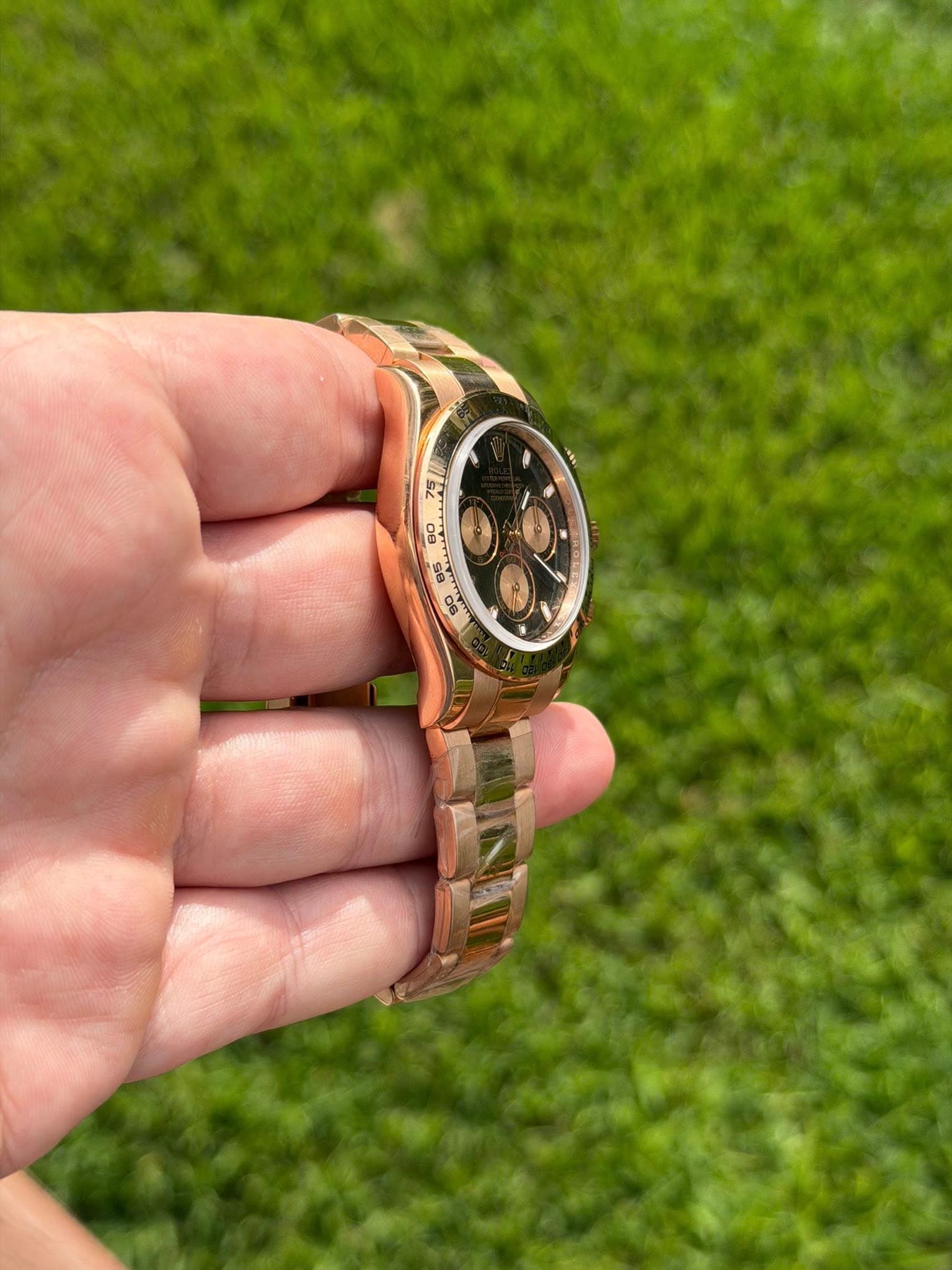 May be an image of wrist watch and text