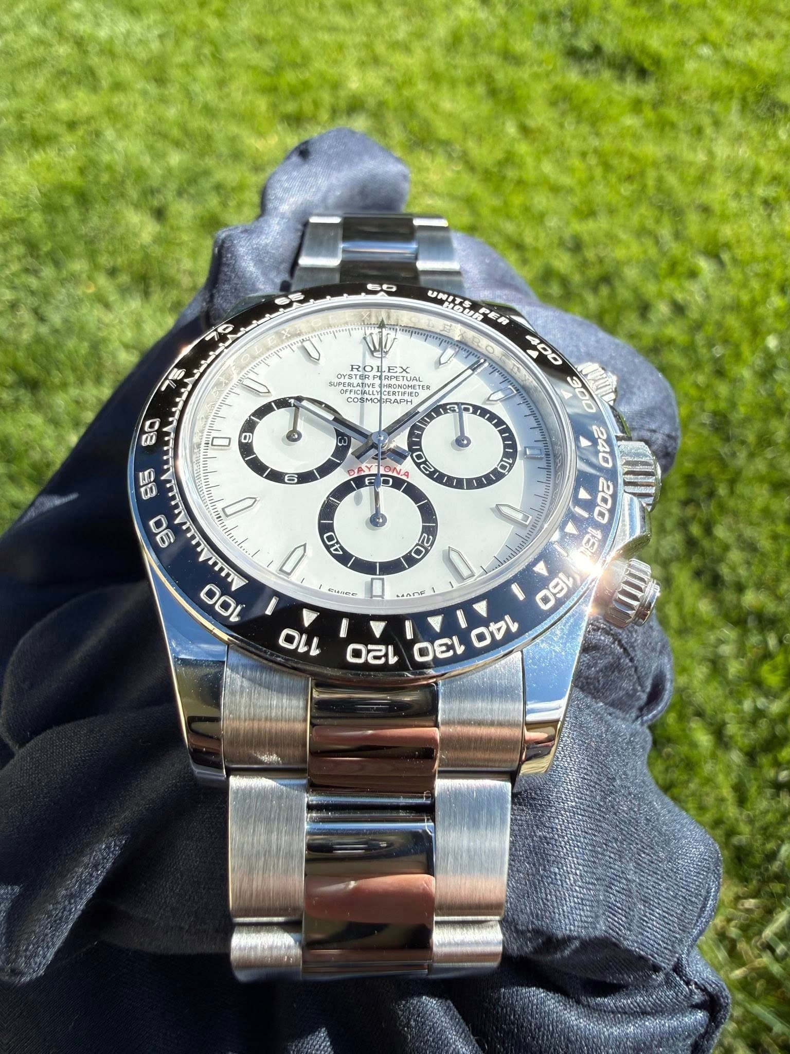 May be an image of wrist watch and text