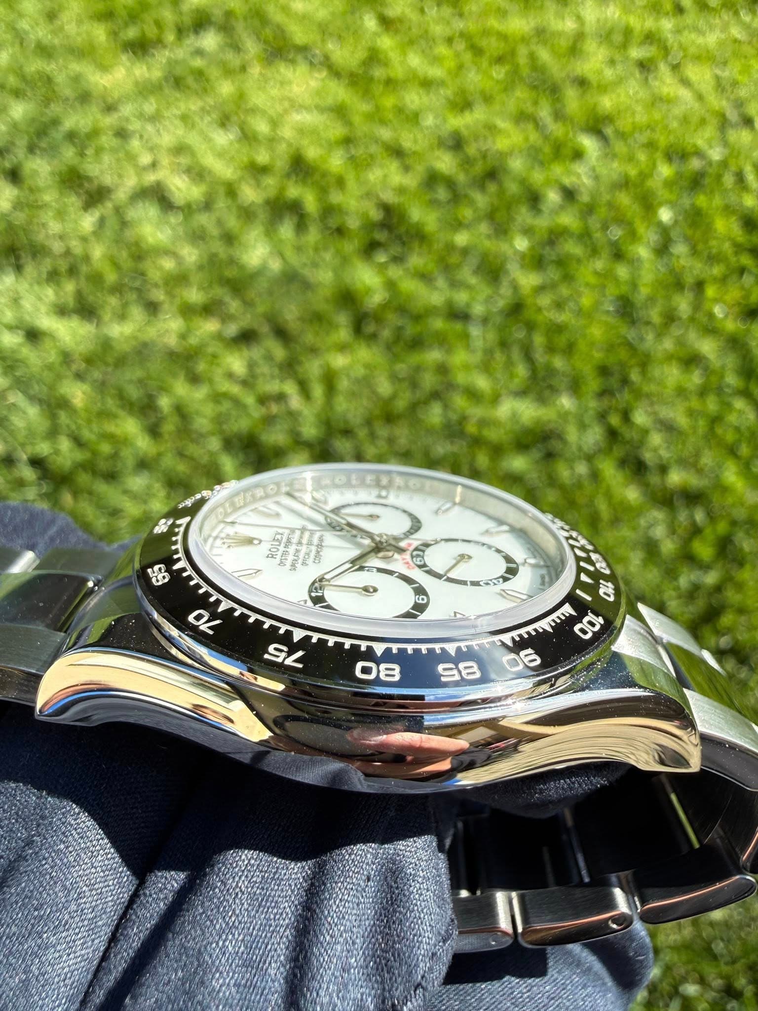 May be an image of wrist watch and text