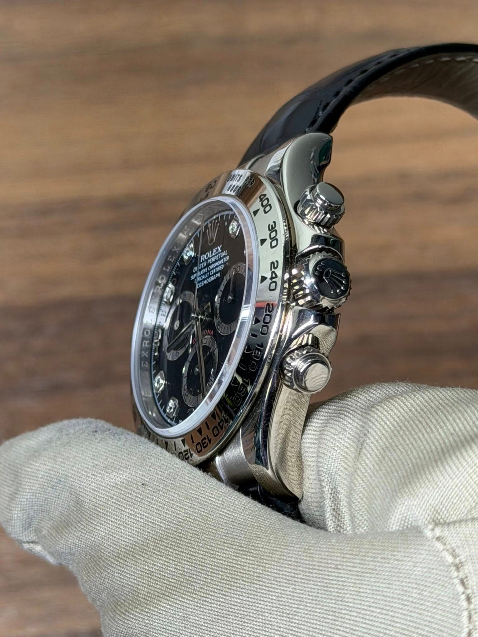 May be an image of wrist watch and text