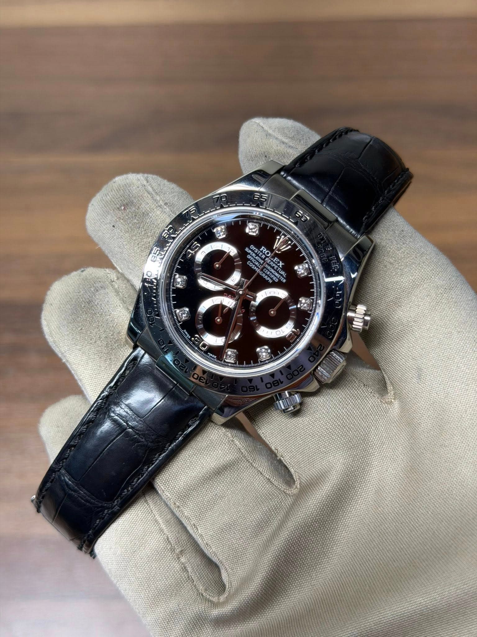 May be an image of wrist watch and text