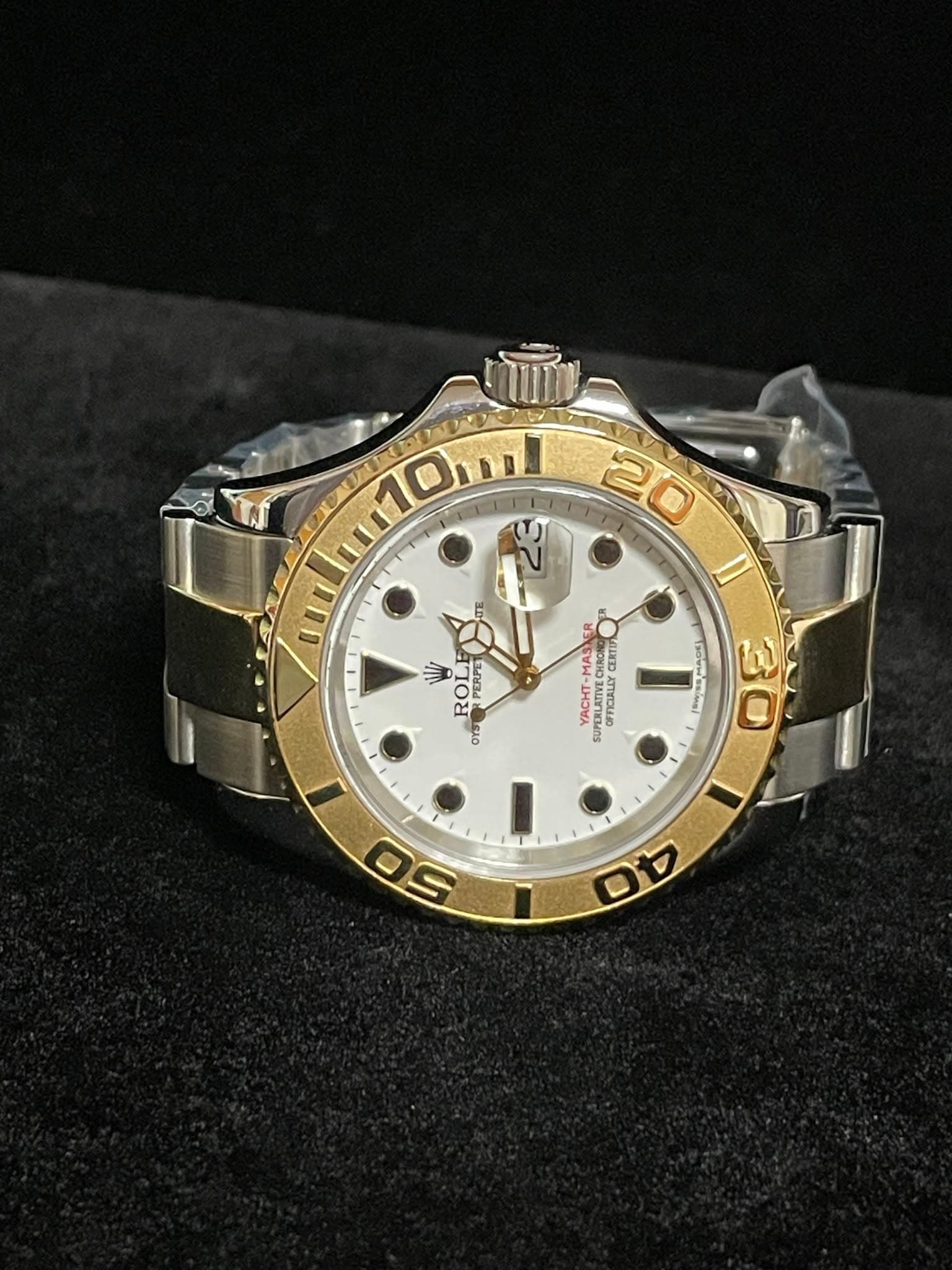 May be an image of wrist watch and text