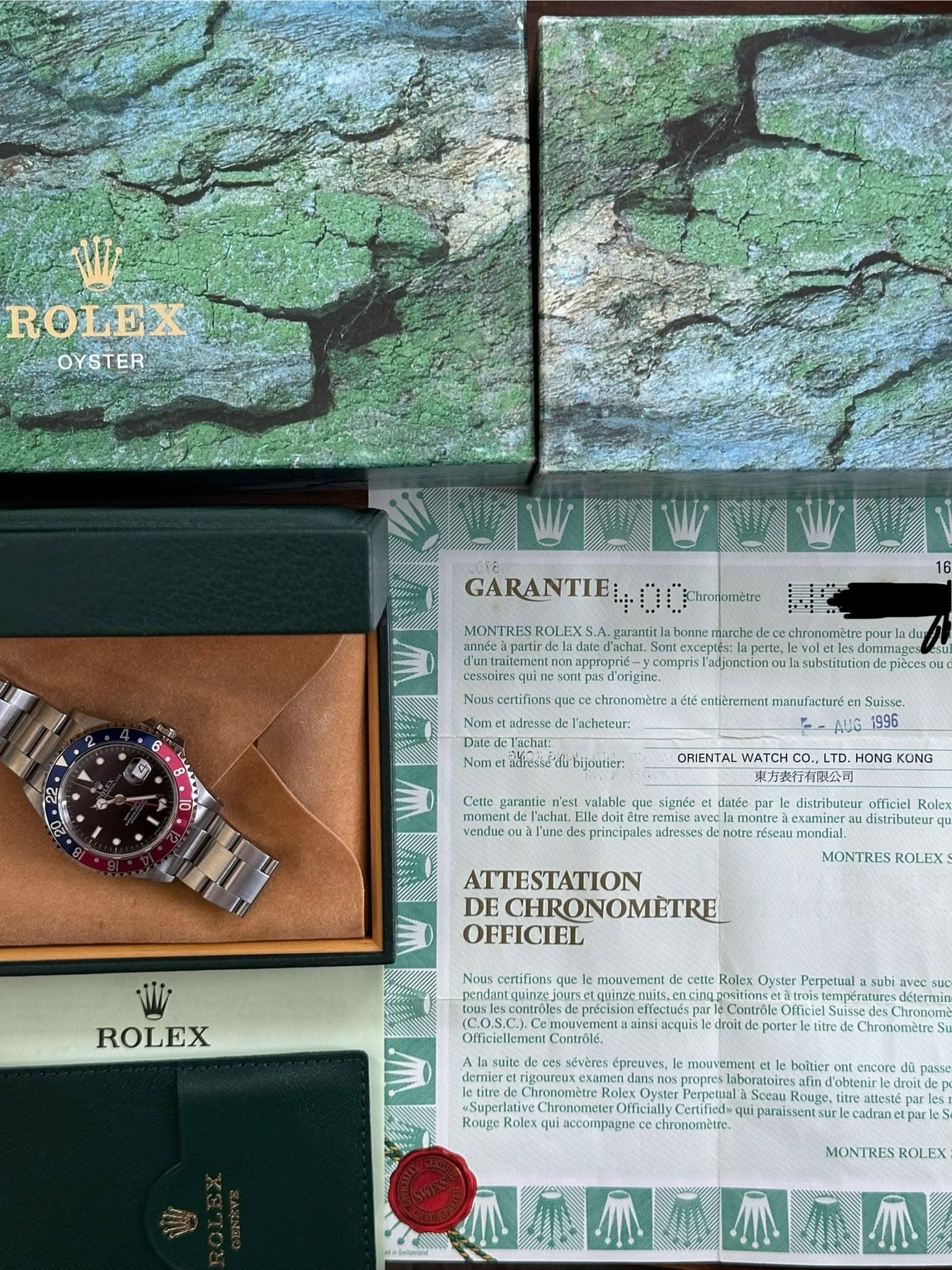 May be an image of map, wrist watch and text that says 'ROLEX OYSTER MONTRES WWWWWWW GARANTIE appropno- N0S0R adjonction ns.que acheteur: Dale Dafe substitutiond esu ou har Nom ésé…