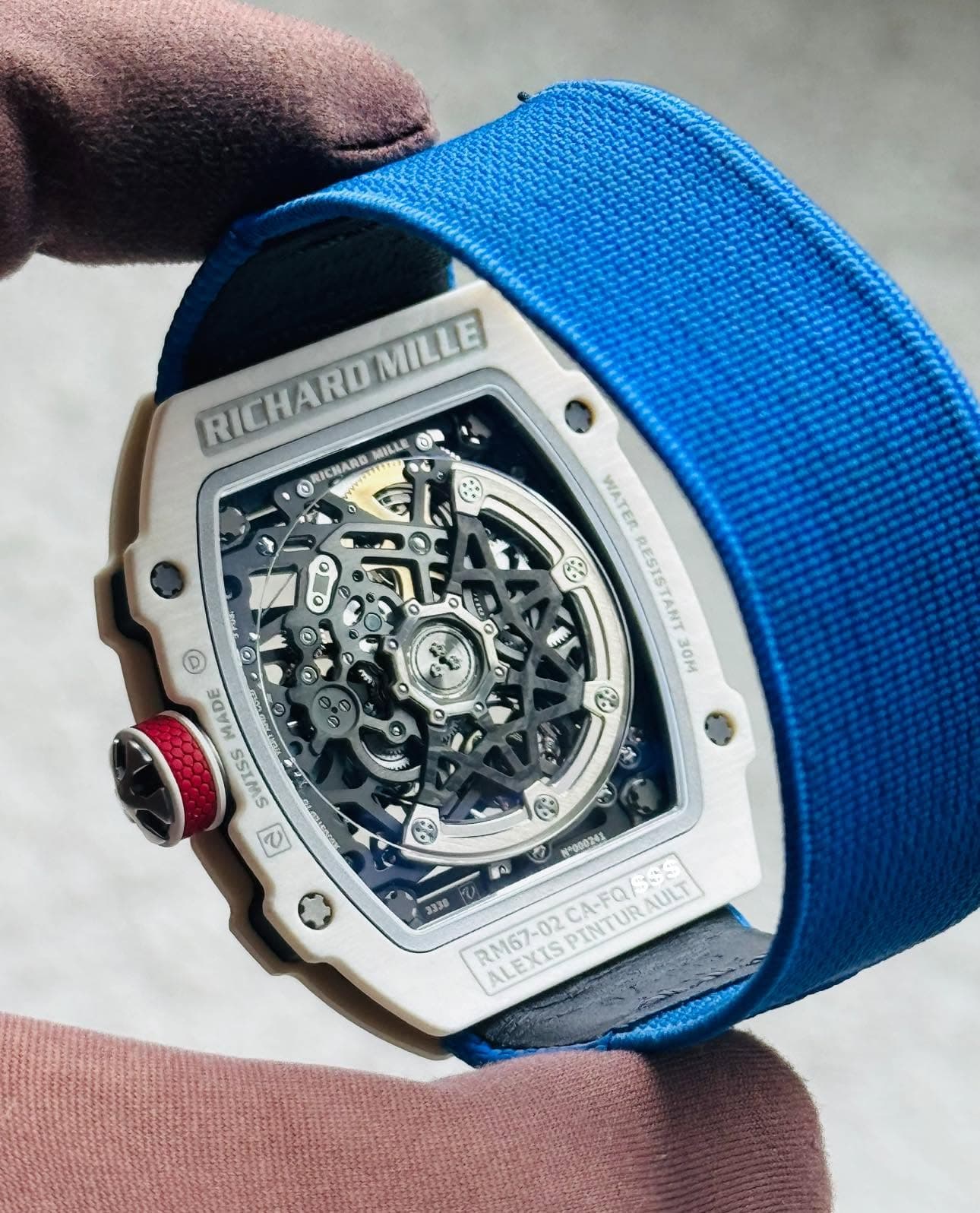 May be an image of wrist watch and text that says 'MILLE O RICHARB MILLE RICHAROMI MLLE HO O WATER RESISTANT 3om © MADE SWISS e P Bor 活 6 0 K*000243 블속 2338 RM67-02 RM67-02CA-FQ/…