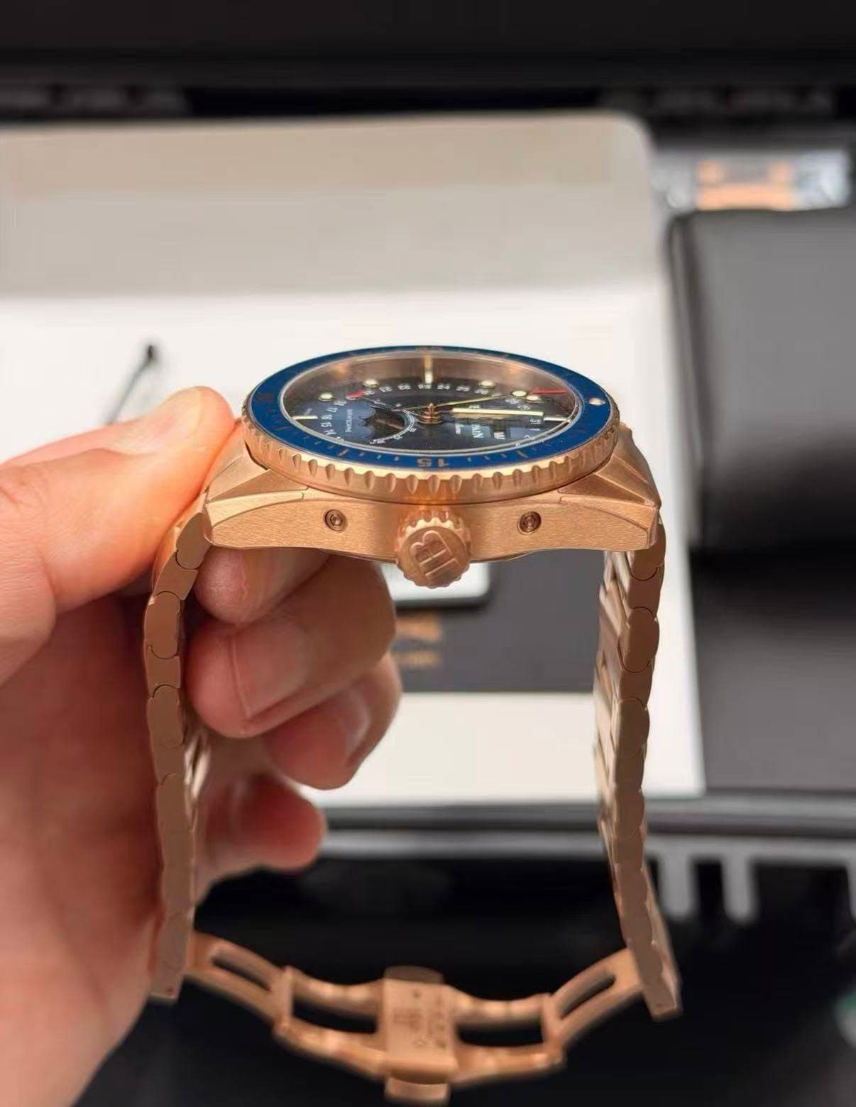 May be an image of wrist watch and text