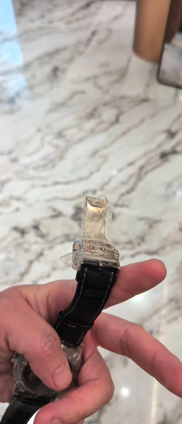 May be an image of wrist watch