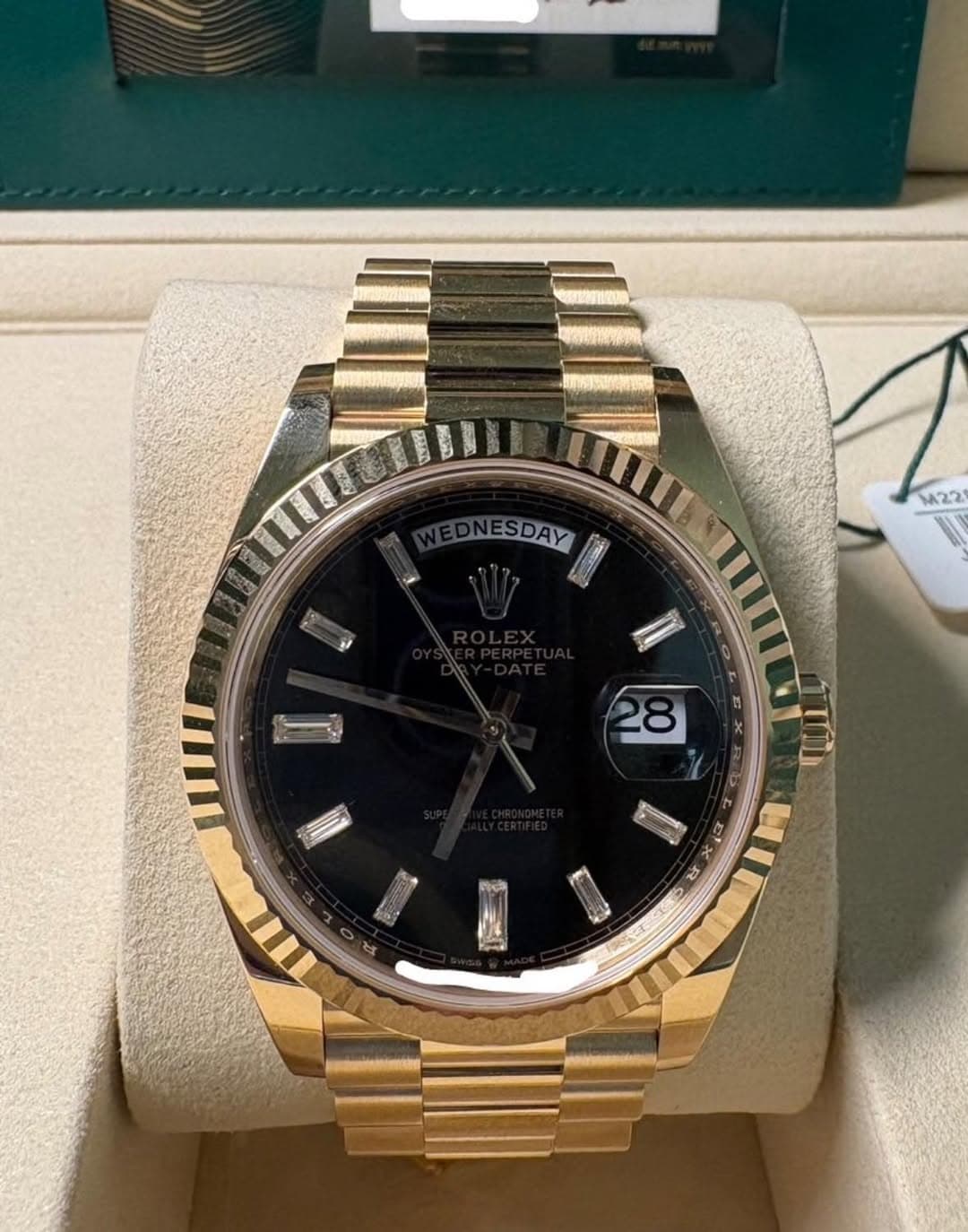 May be an image of wrist watch and text