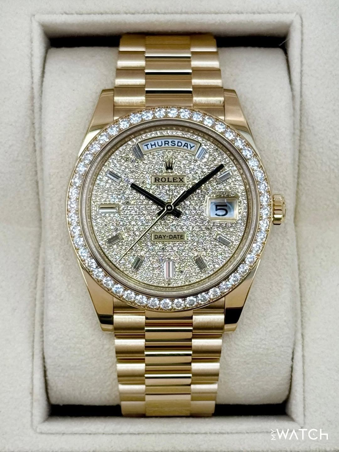 May be an image of wrist watch and text that says 'THURSDAY MI 11 WATCH'