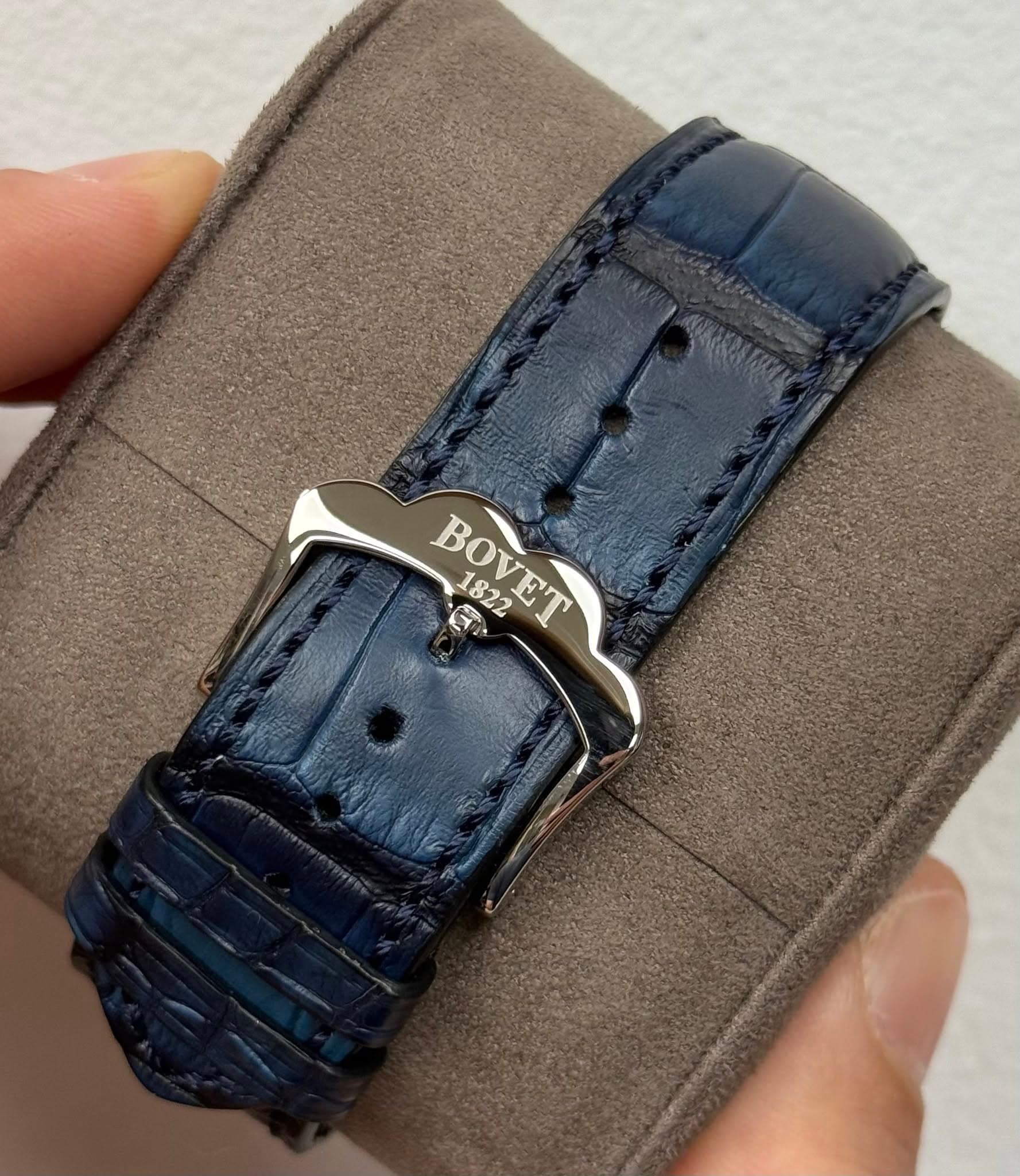 May be an image of leather, saddle-stitched leather, wrist watch and text that says 'BOVET G A 1822'