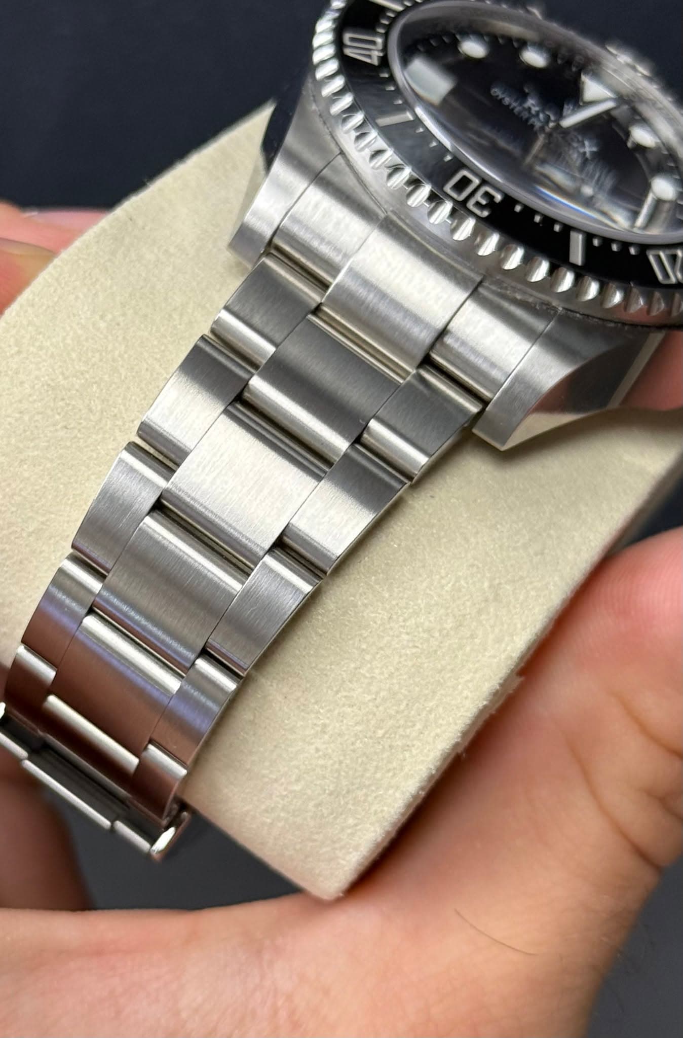 May be an image of wrist watch and text