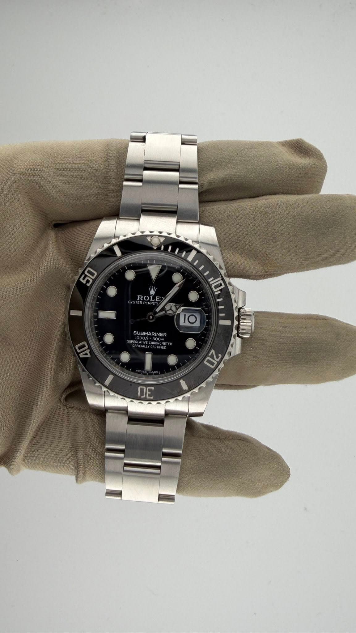 May be an image of wrist watch and text that says '50 ROL 10, 人 10 12 1ማ nE'