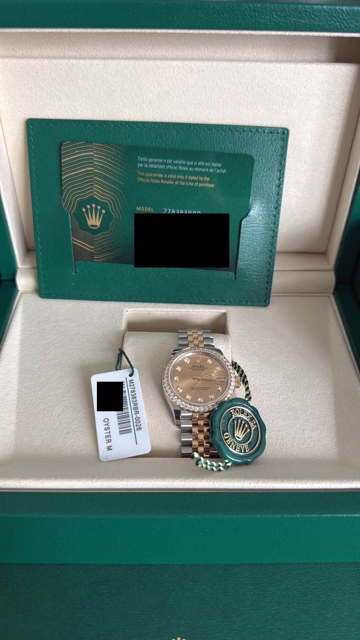 May be an image of wrist watch and text
