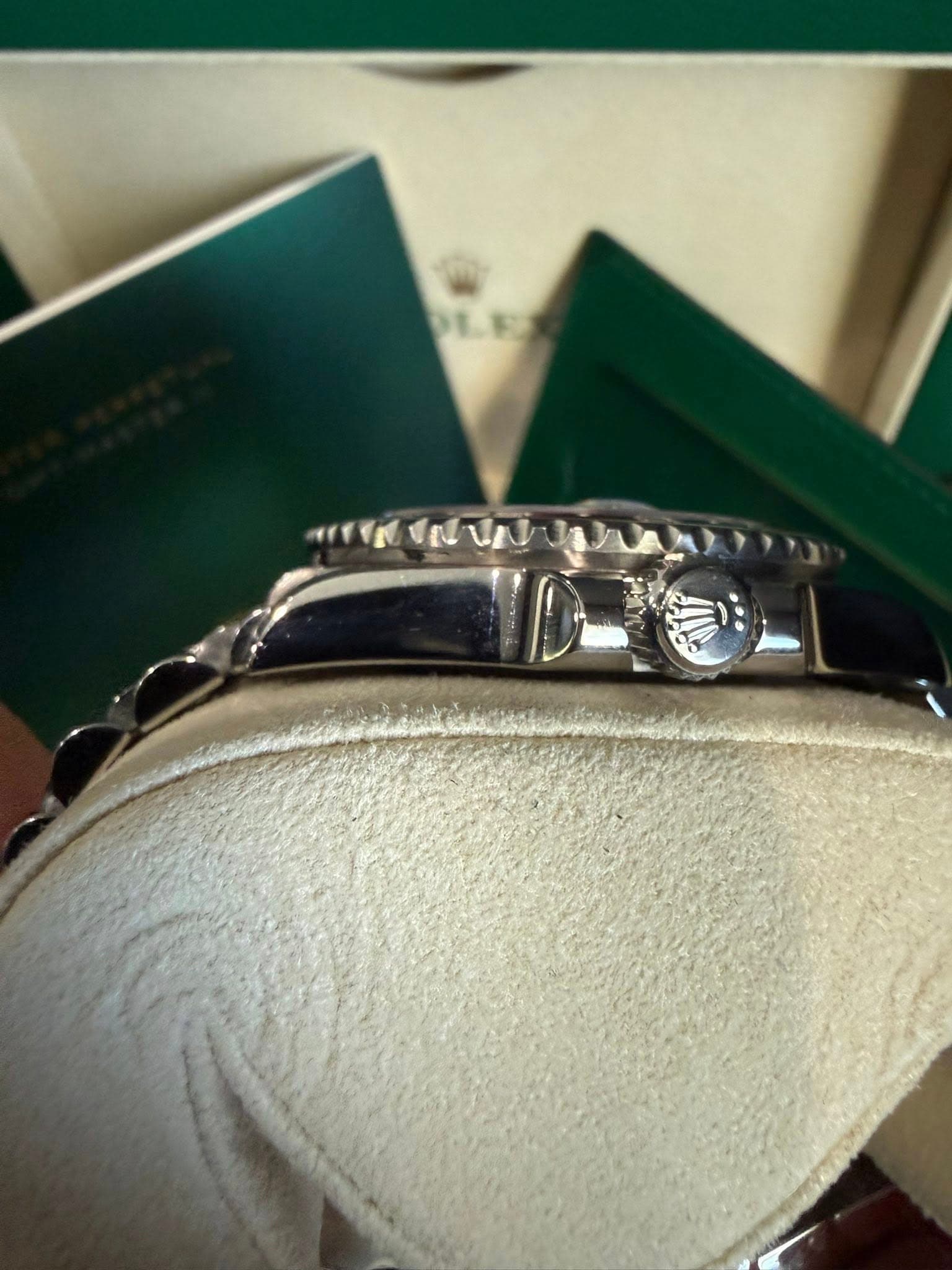 May be an image of wrist watch and text