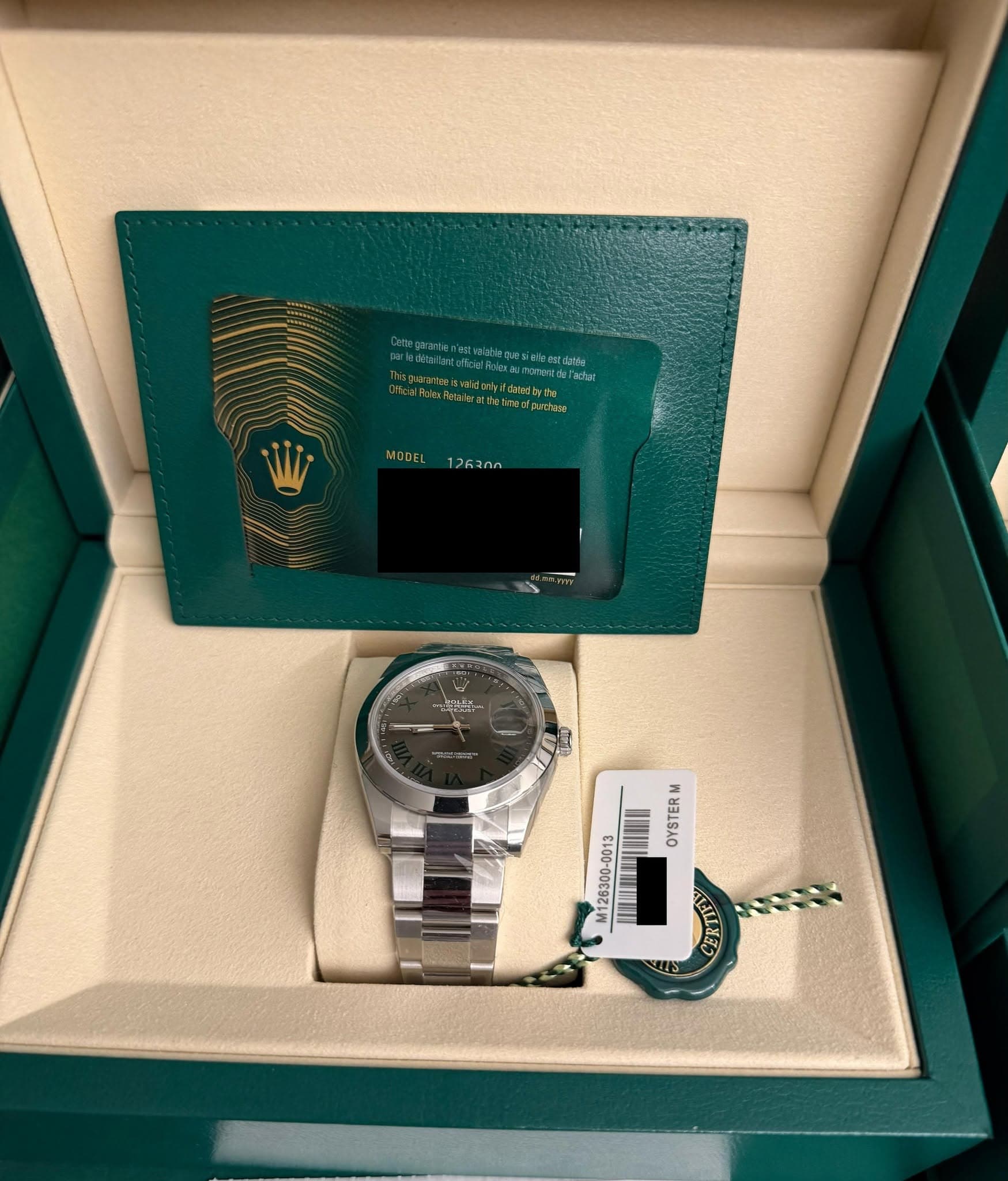 May be an image of wrist watch and text