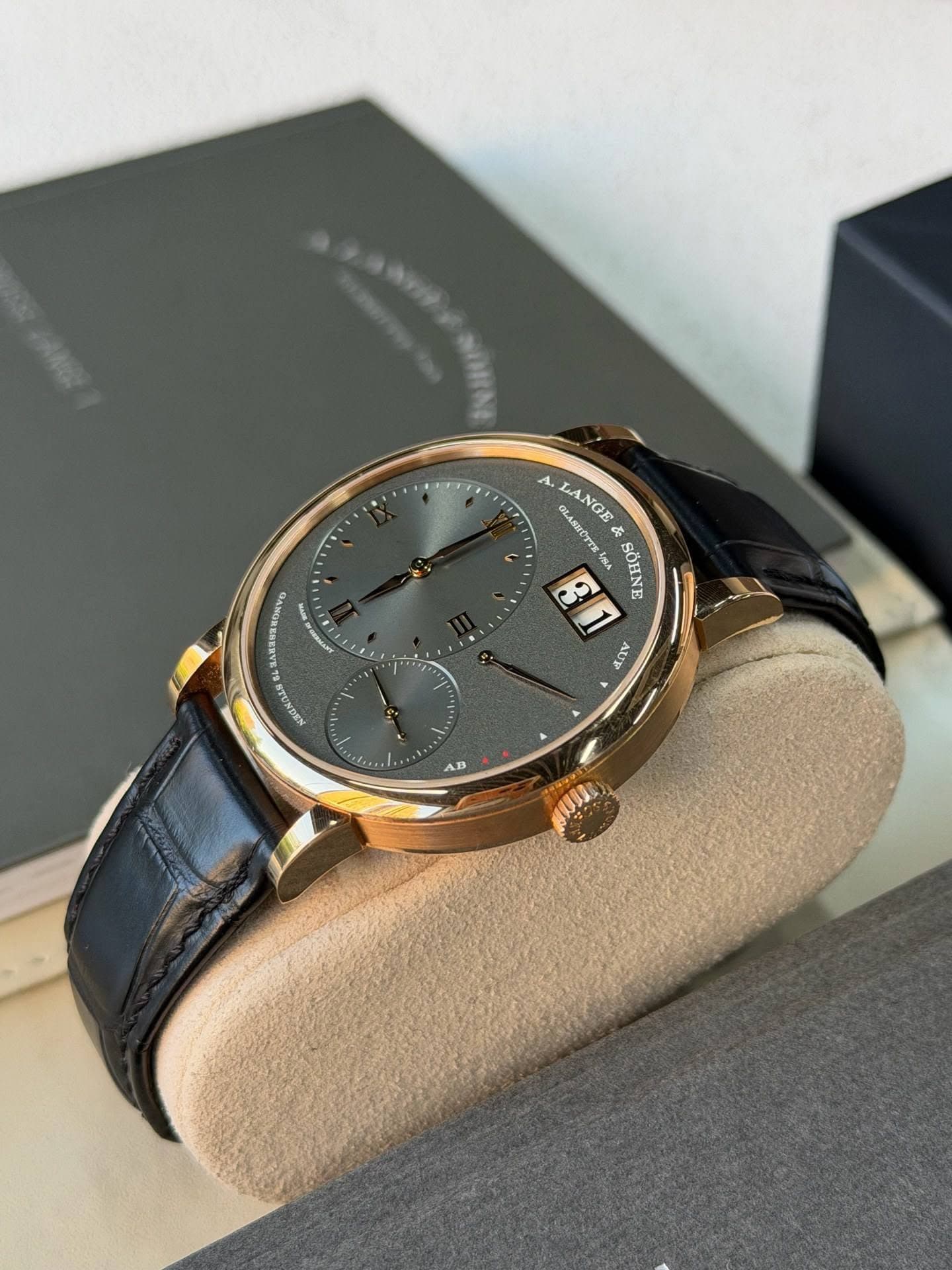 May be an image of wrist watch and text