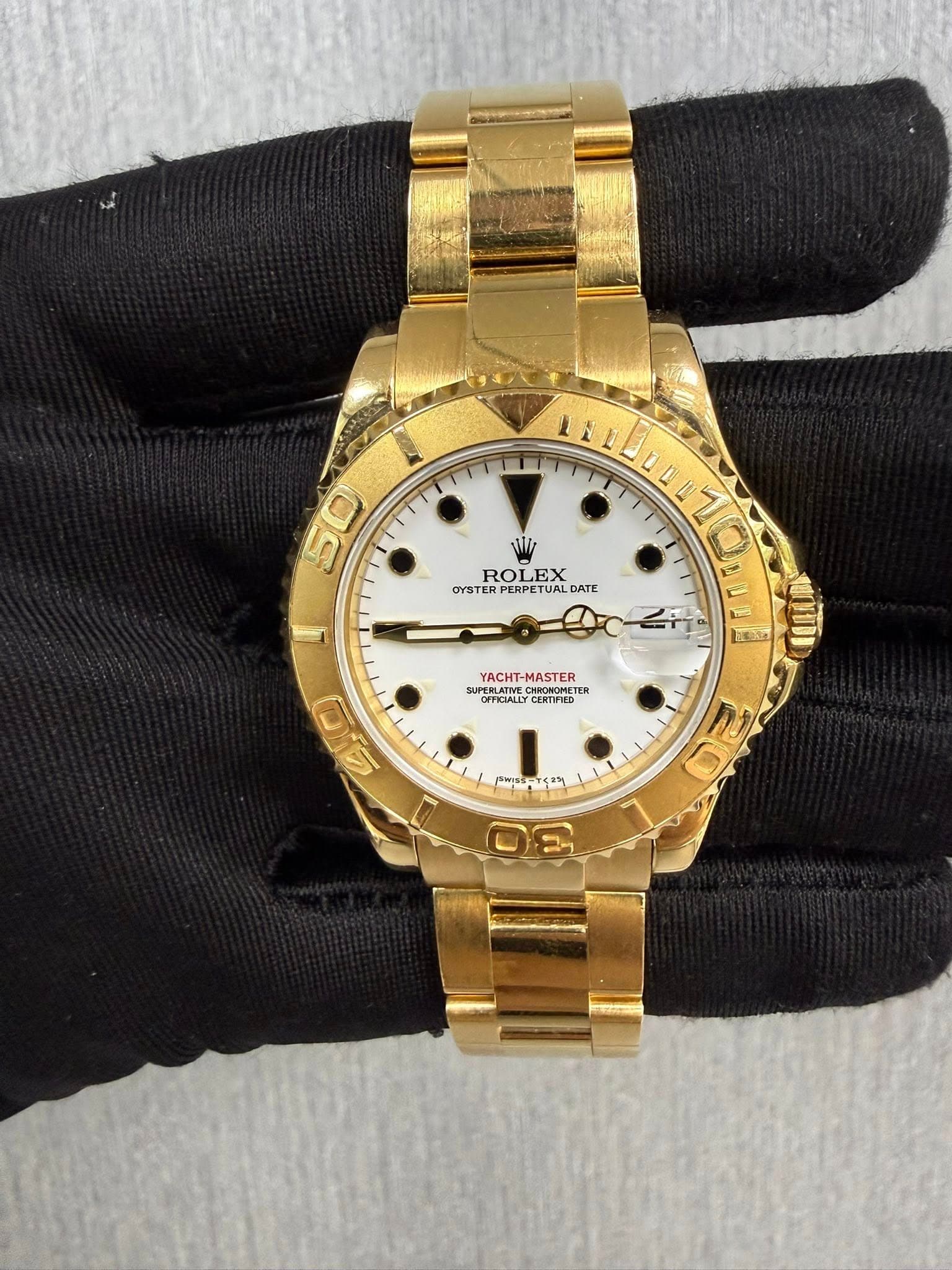 May be an image of wrist watch and text that says '50 ROLEX y OYSTERPERPETUAL ROLFLDATE PERPETUAL DATE YACHT-MASTER yACH-M SUPERLATIE সষ OFFICIALLY CERTIFIED בעמי 20 2 O هر1 ک…