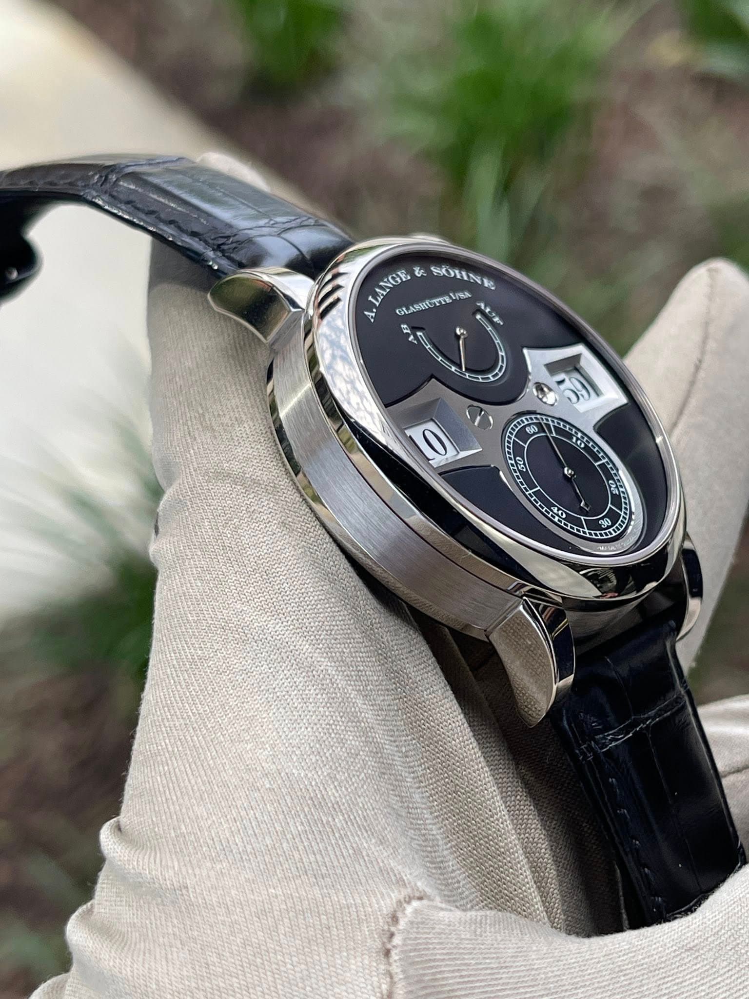 May be an image of wrist watch and text