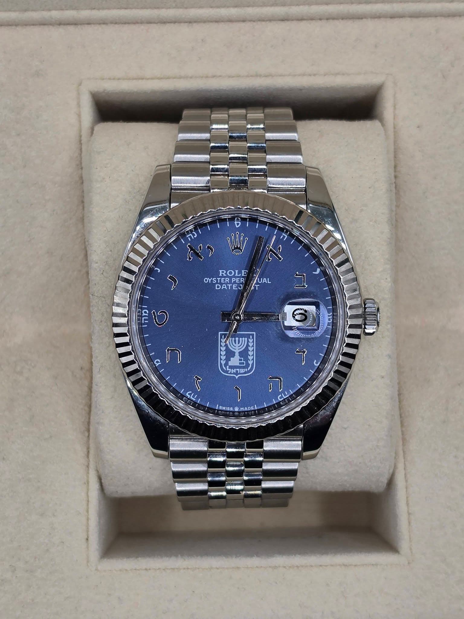 May be an image of wrist watch and text that says 'נה ROLE OYST ERPER PER UAL DATEJ OYSTERES/UAL DAT ב מהו 0 ස 0D ၄ ח با S4 ד LMSM HADC CU'