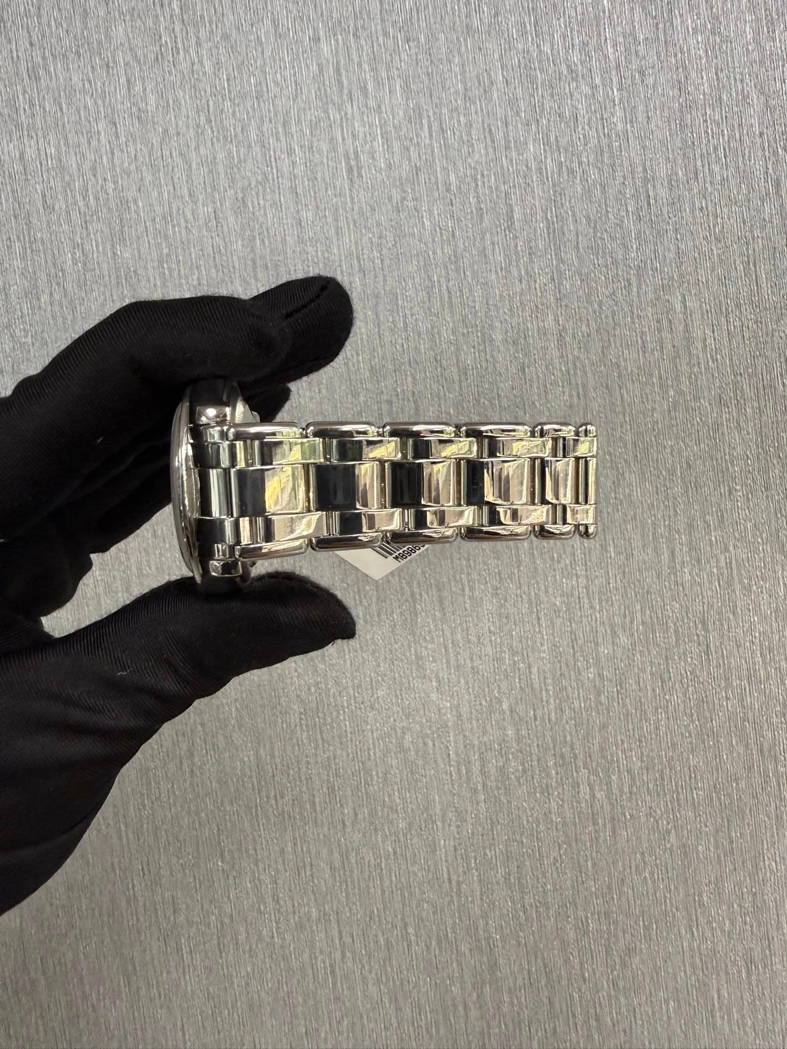 May be an image of wrist watch