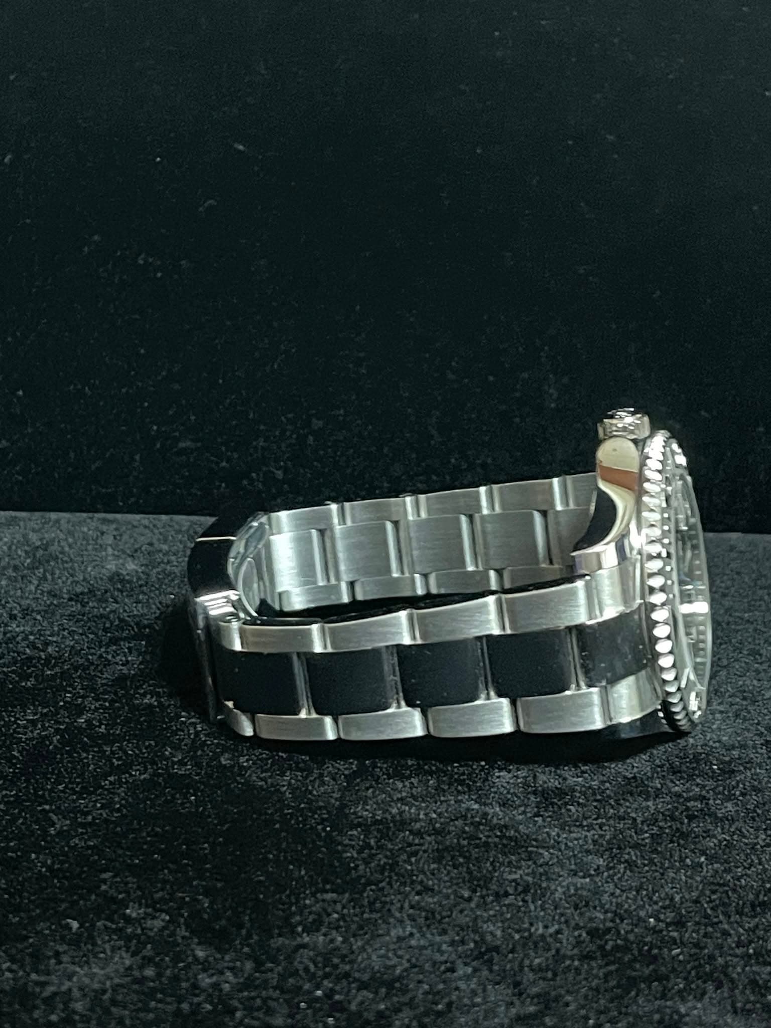 May be an image of wrist watch and text