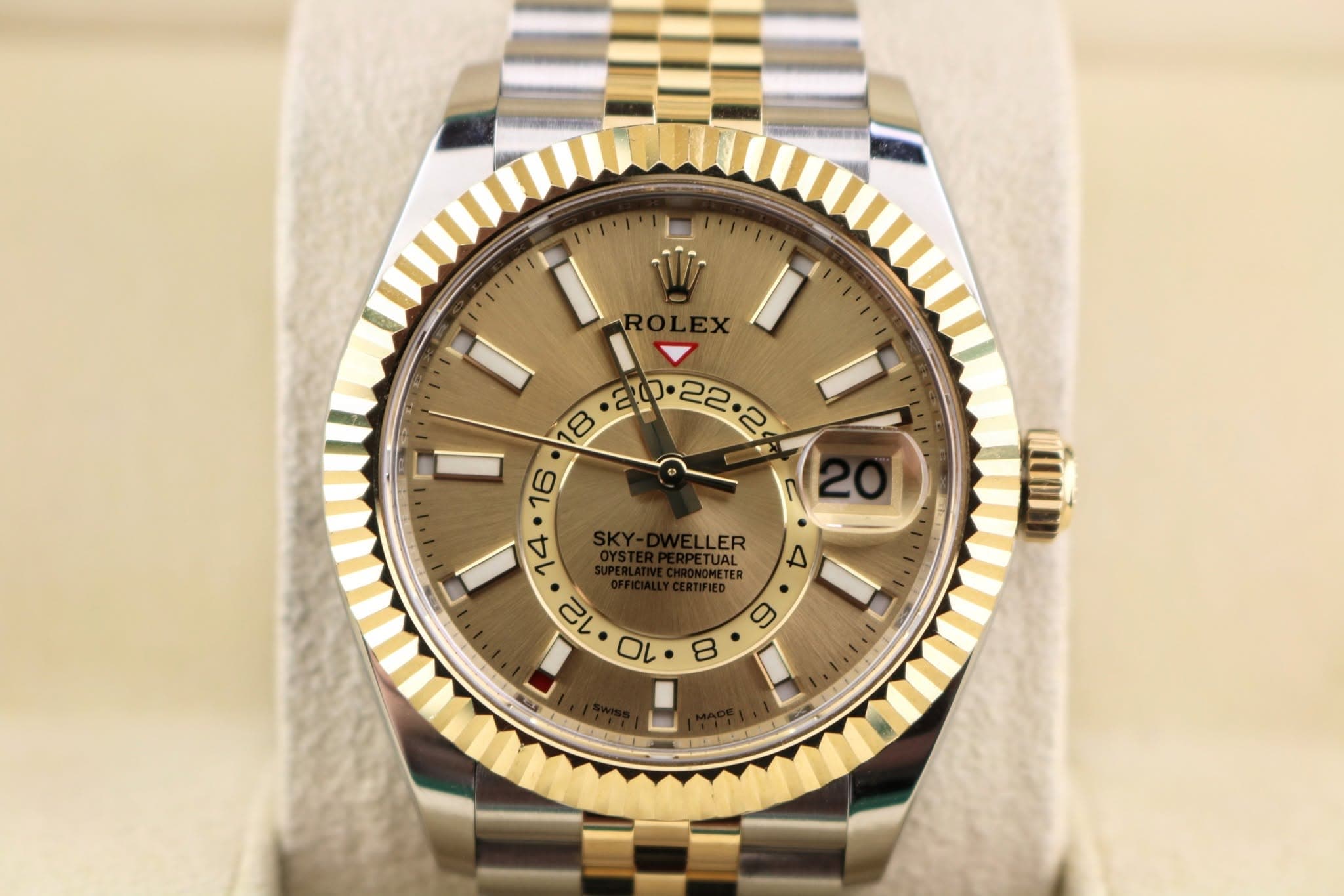 May be an image of wrist watch and text