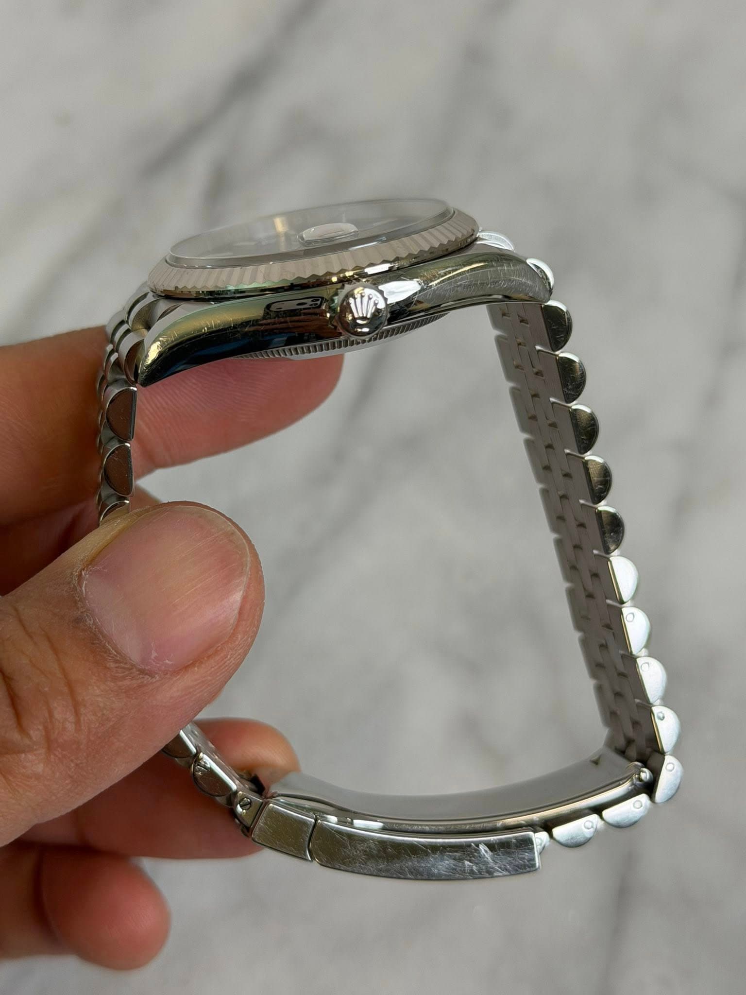 May be an image of wrist watch