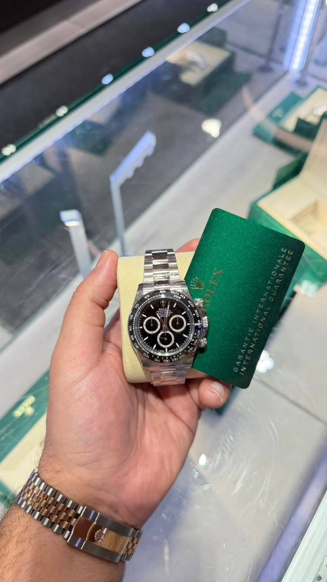 May be an image of wrist watch and text