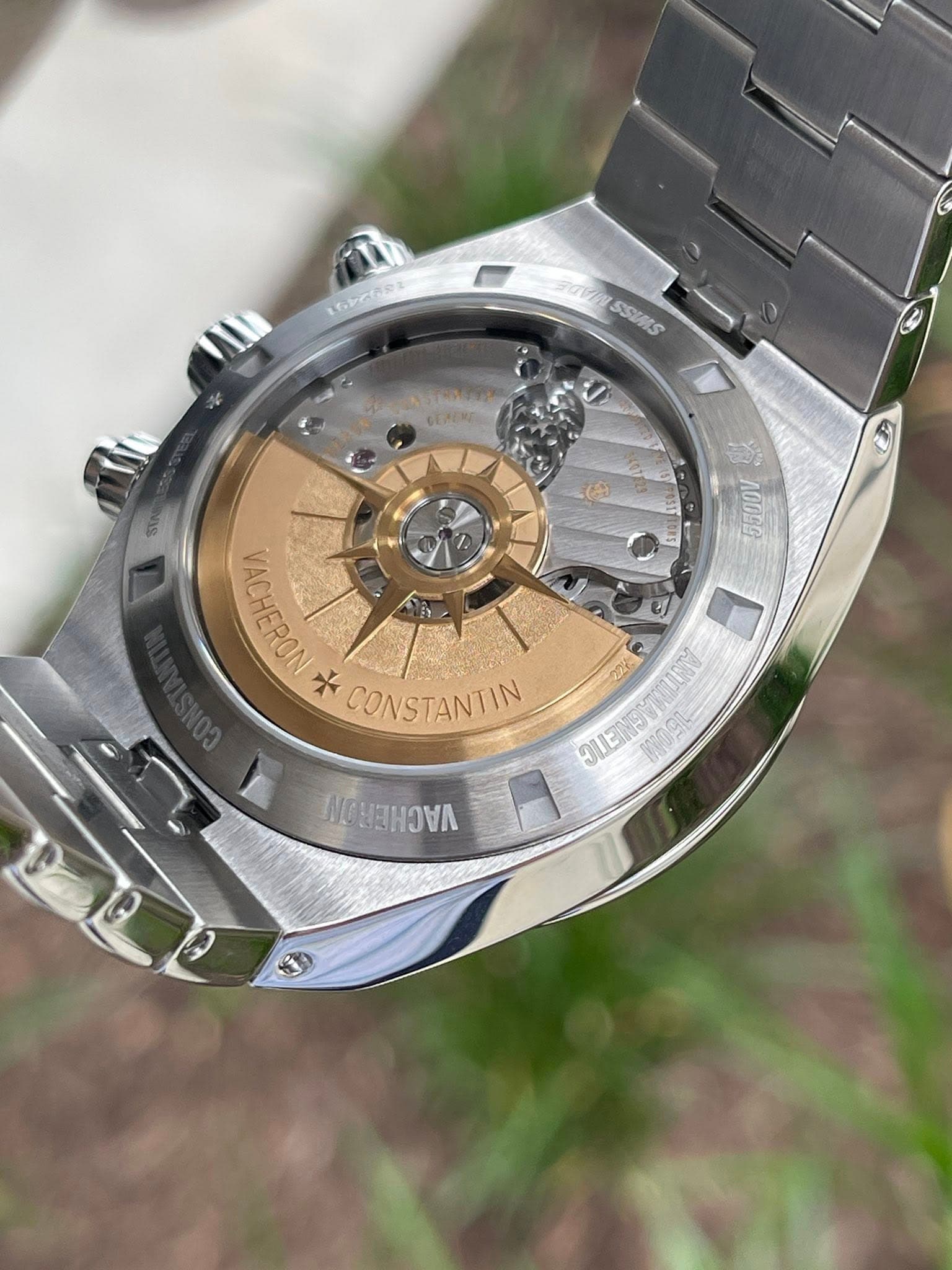 May be an image of wrist watch and text