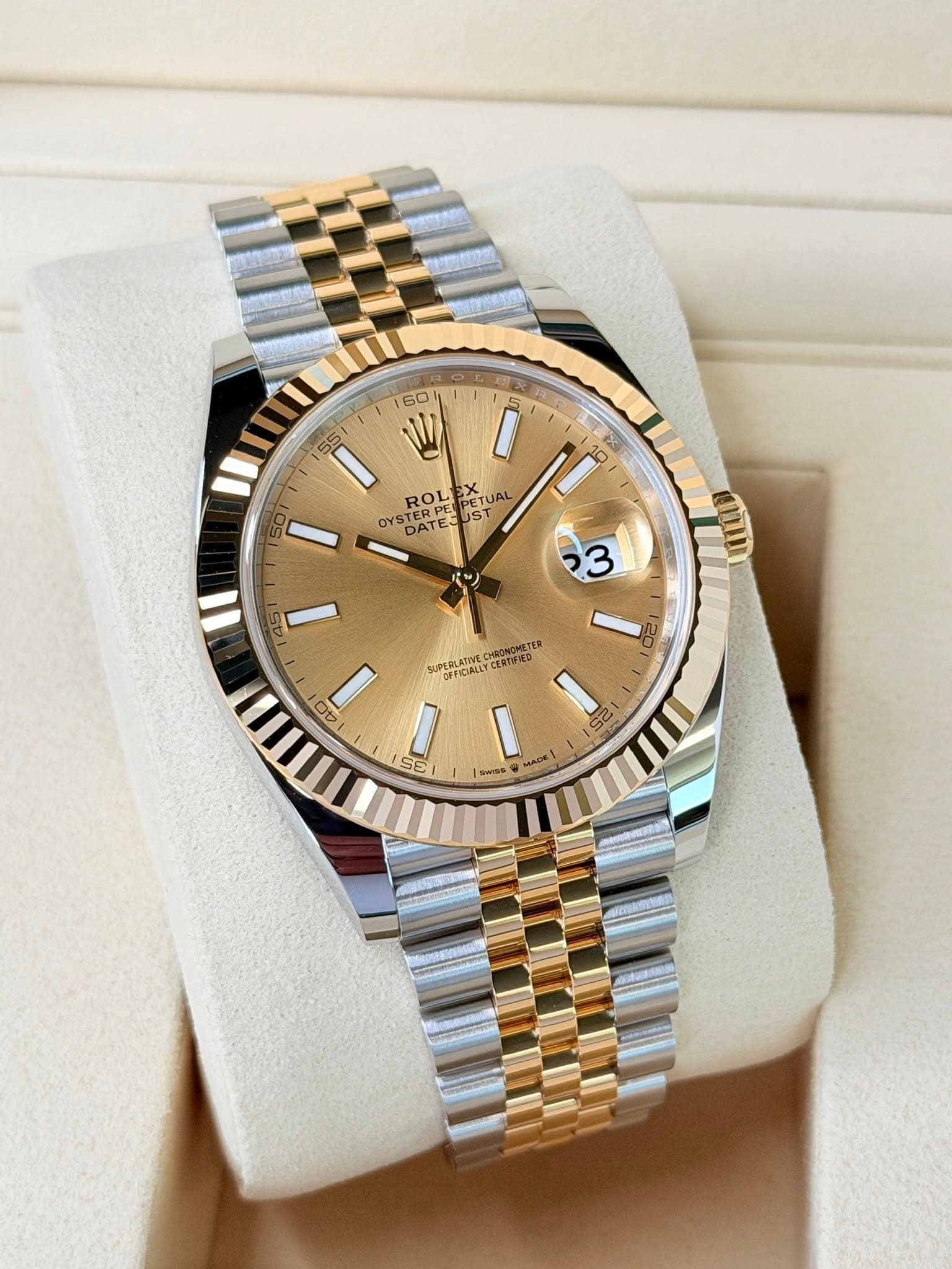 May be an image of wrist watch and text