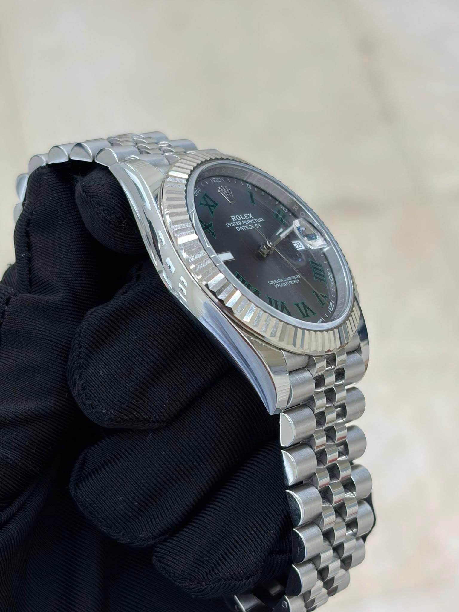 May be an image of wrist watch and text