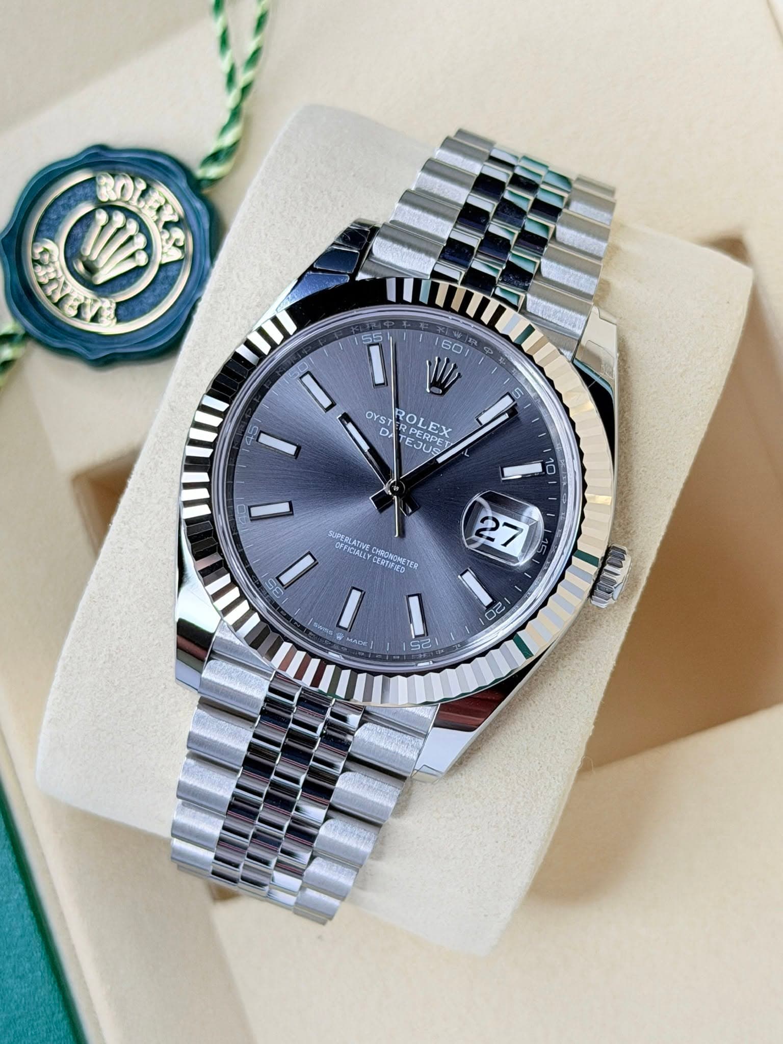 May be an image of wrist watch and text