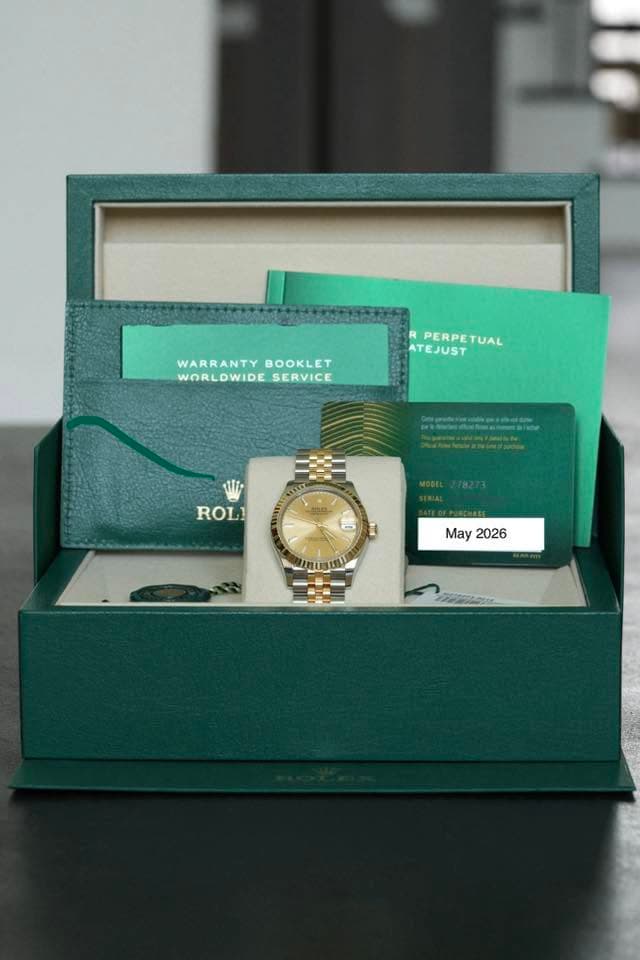 May be an image of wrist watch and text that says 'WARRANTYBOOKLET WARRANTY BOOKLET WORLDWIDE_SERVICE WORLDWIDE SERVICE PERPETUAL TUAL ATEJUST rtakesanidao 17 ROLI May 2026 INUsIa'