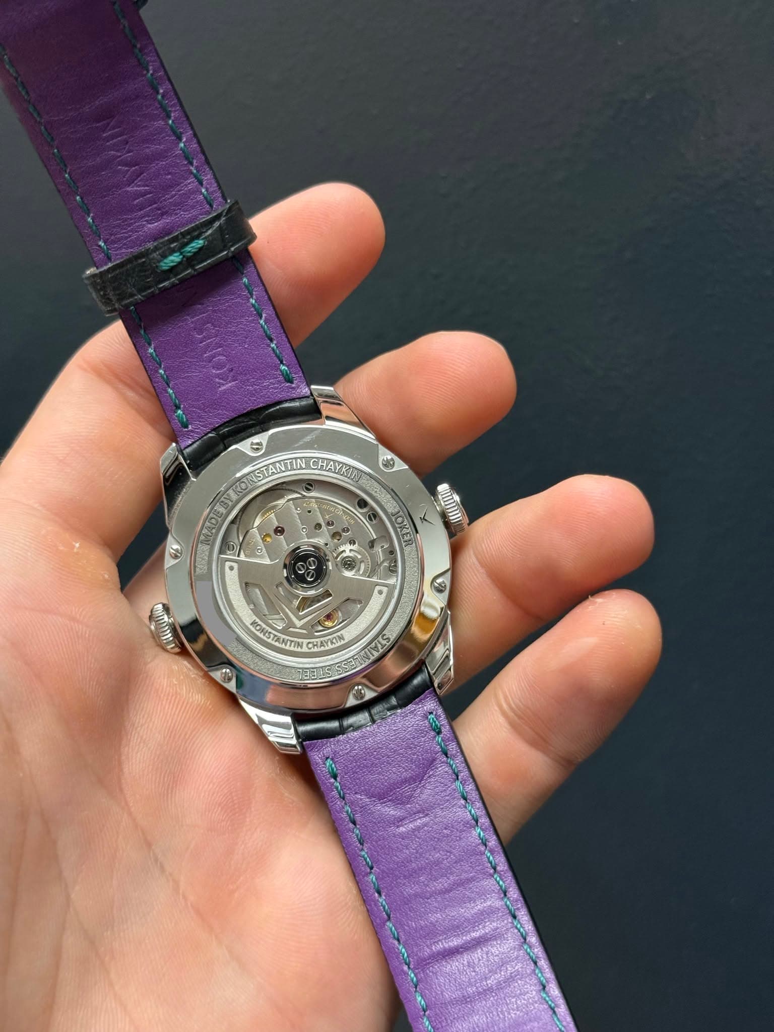May be an image of wrist watch and text