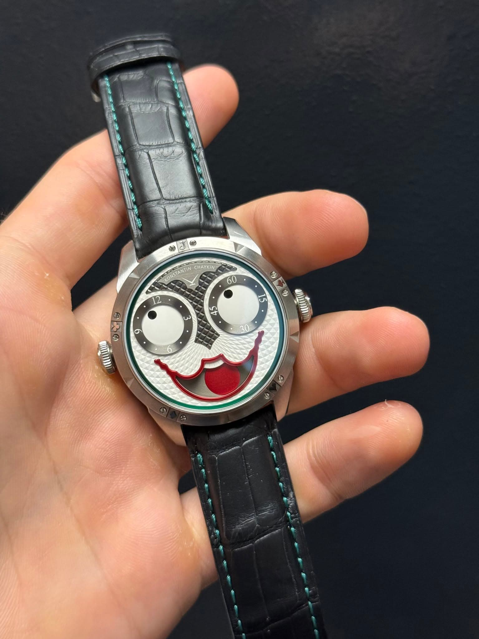 May be an image of wrist watch and text