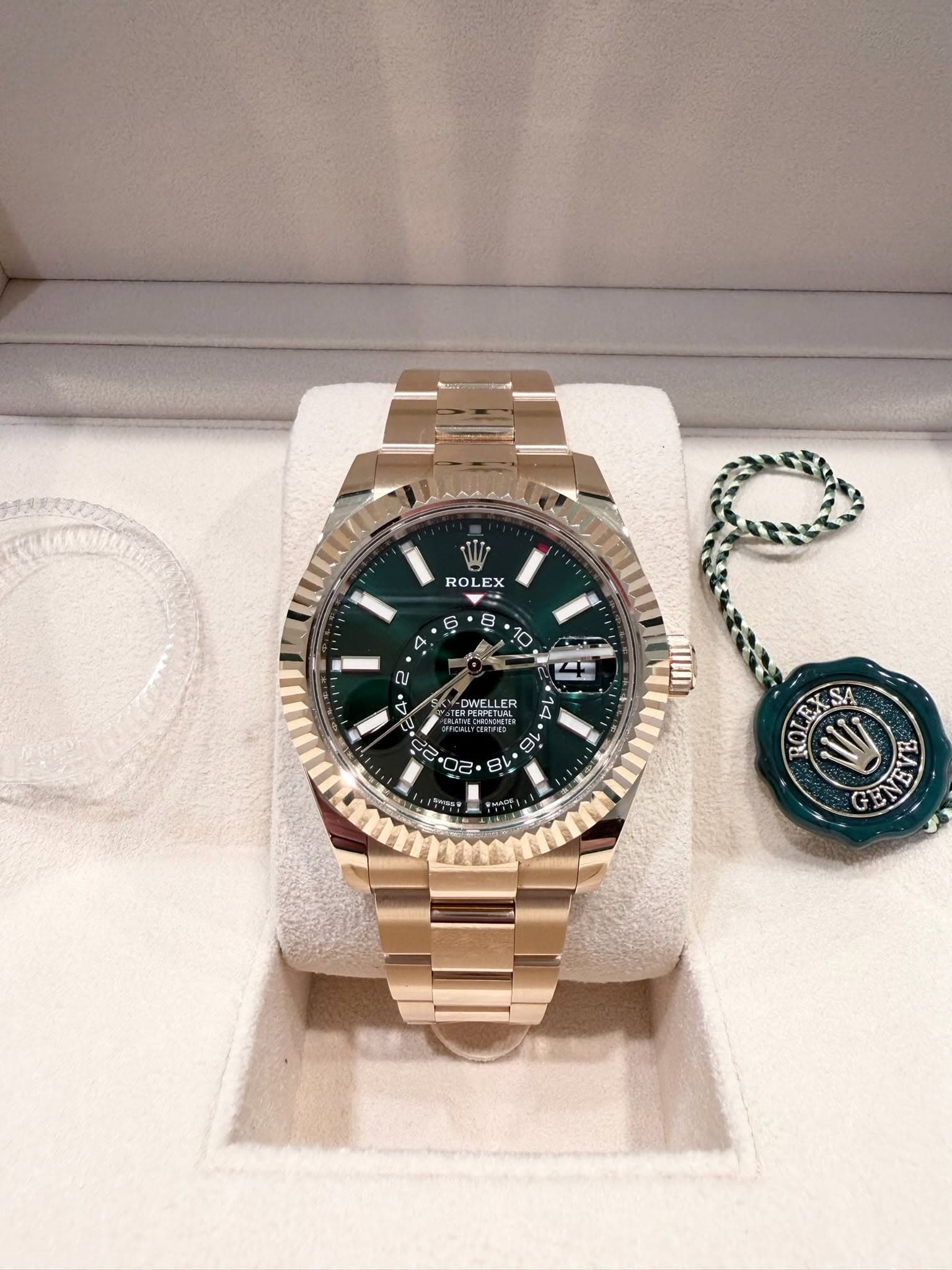 May be an image of wrist watch and text