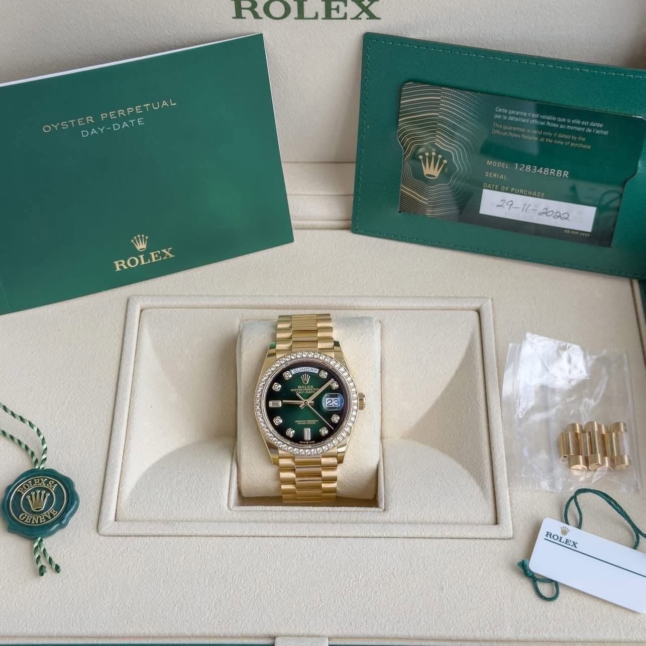 May be an image of wrist watch and text that says 'ROLEX OYSTER DAY-DATE OYSTERPERPETUAL DAY PERPETUAL Wi ROLEX MODEL MEDEL128348RBR 128 348RBR 물이 োાর ® & 3 d S ្រា O นิก 23 ® 零 L…