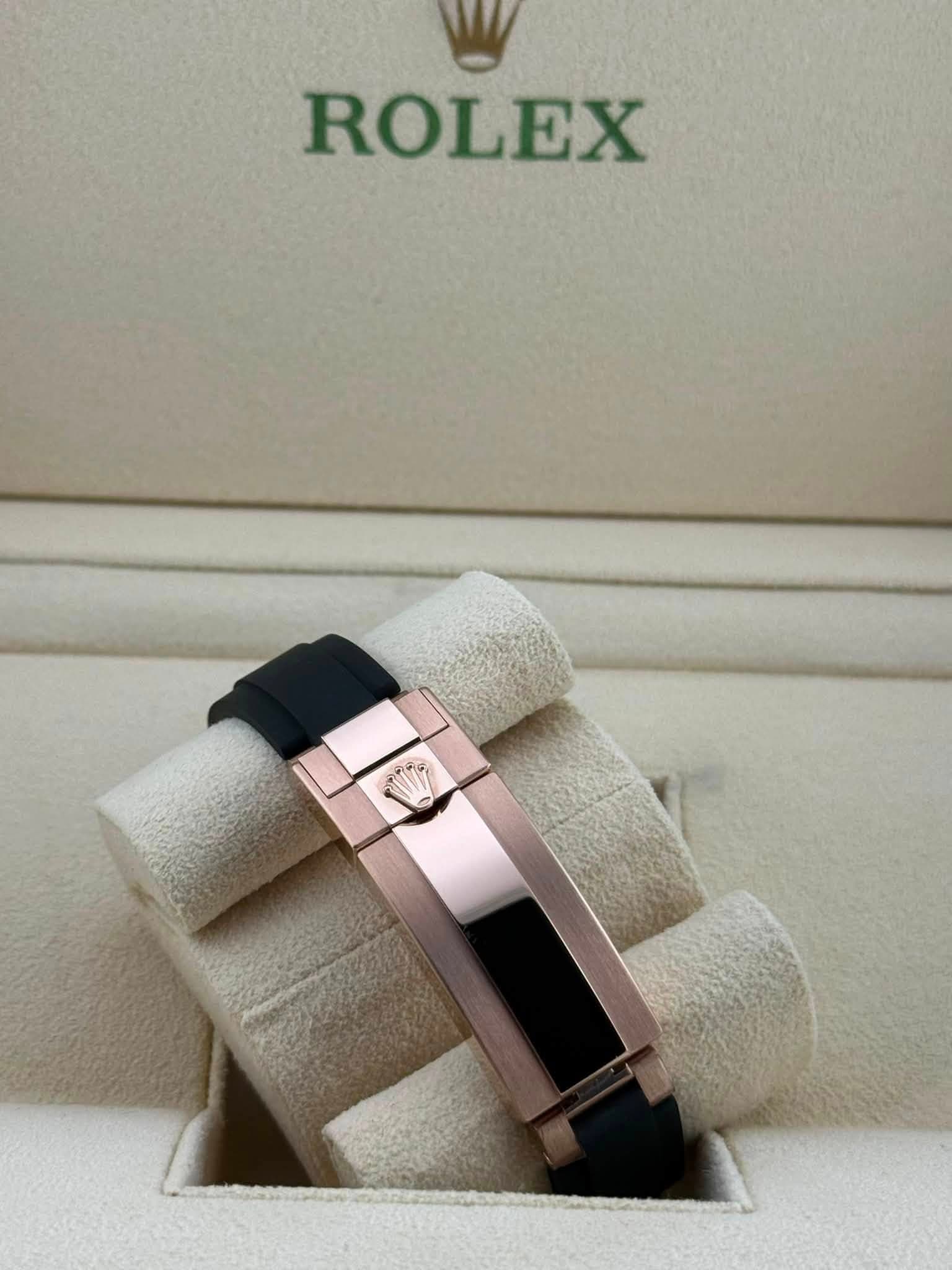 May be an image of jewelry, wrist watch and text that says 'ROLEX'