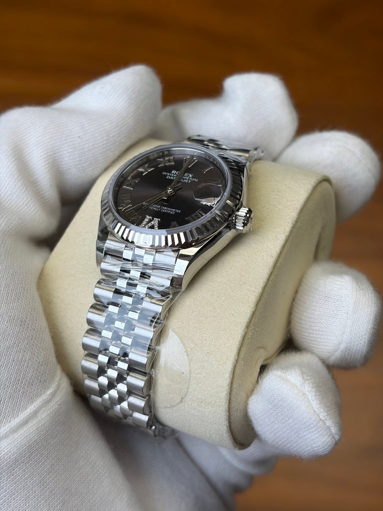 May be an image of wrist watch and text