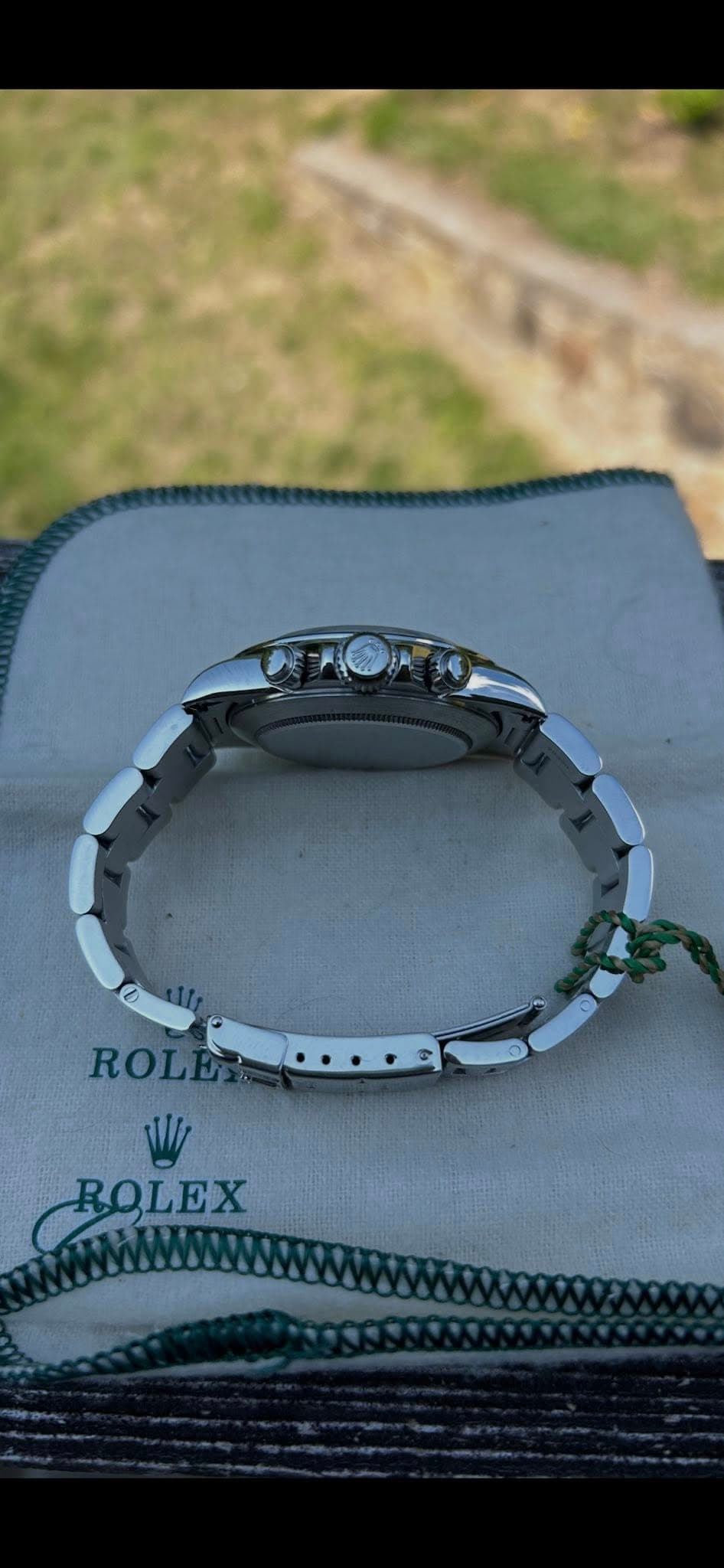 May be an image of wrist watch, jewelry and text