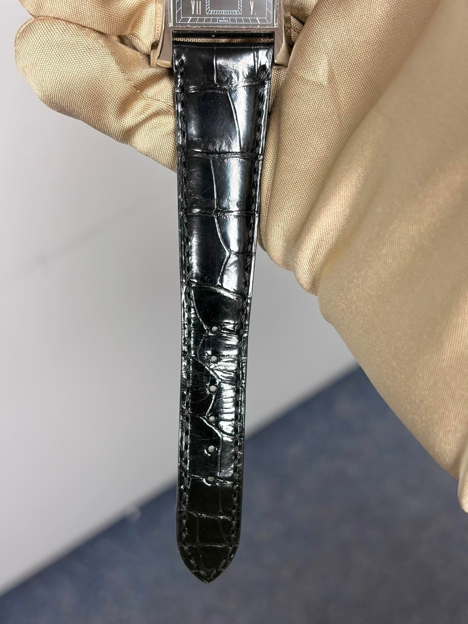 May be an image of wrist watch and leather