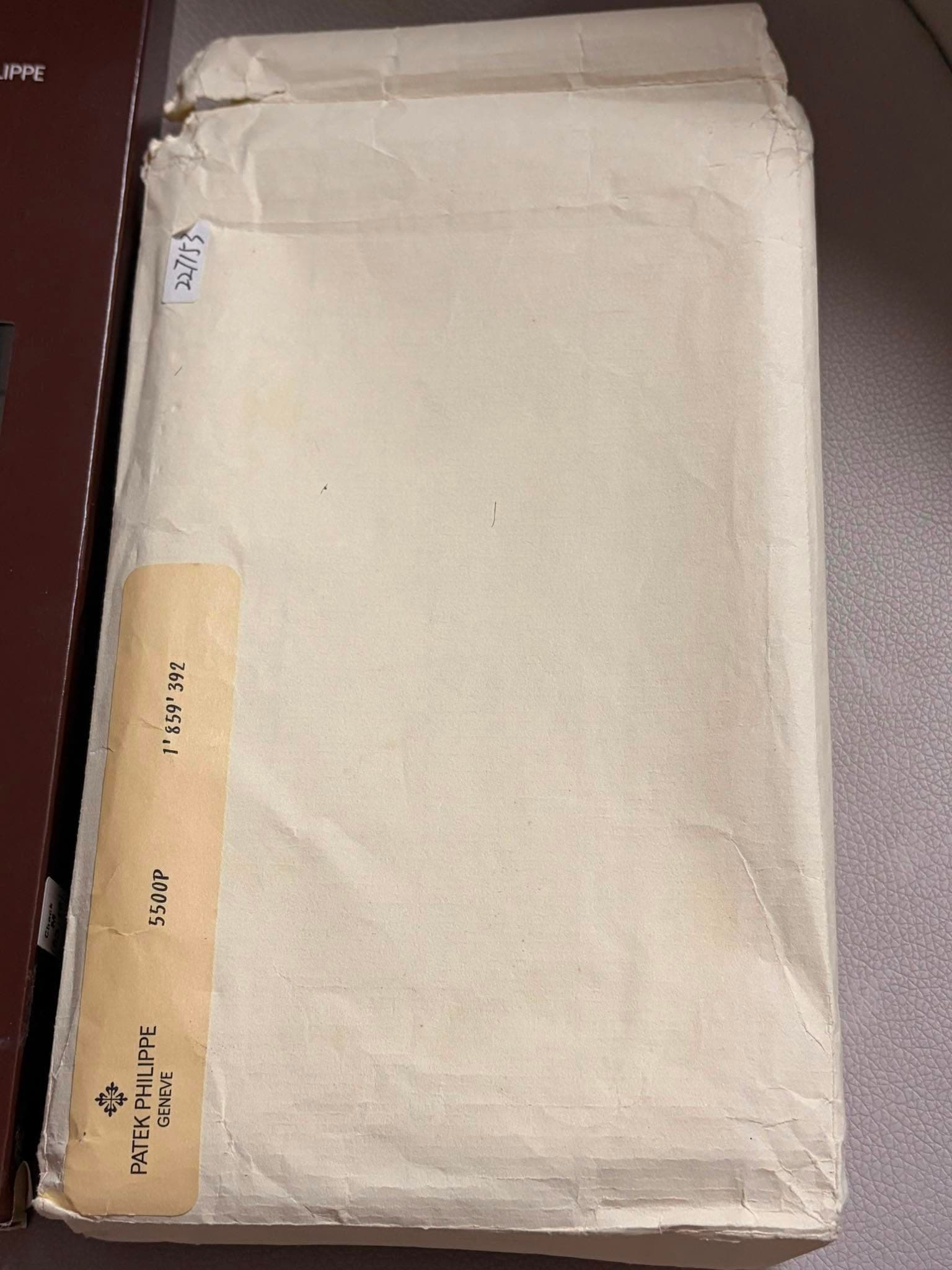 May be an image of book and text that says 'PPE おでて L 500se 5ooss 00S ትች 球 ATEKPHILIPPE PATEK PHILIPPE GENEVE'
