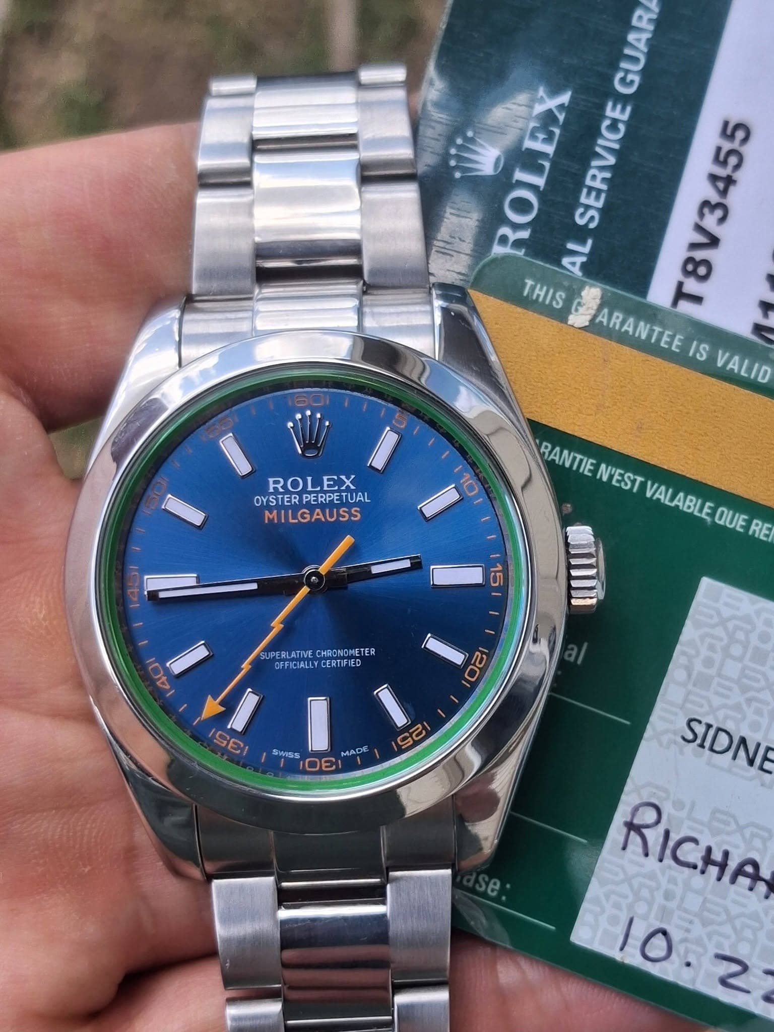 May be an image of wrist watch and text that says 'GUAR ROLEX AL SERVICE THIS T8V3455 ARANTEE IS VALID ROLEX OYSTER OYSTERPERPETUA PERPET TUAL MILGAUSS 10 RANTIE RANTIEN'EST N'EST…
