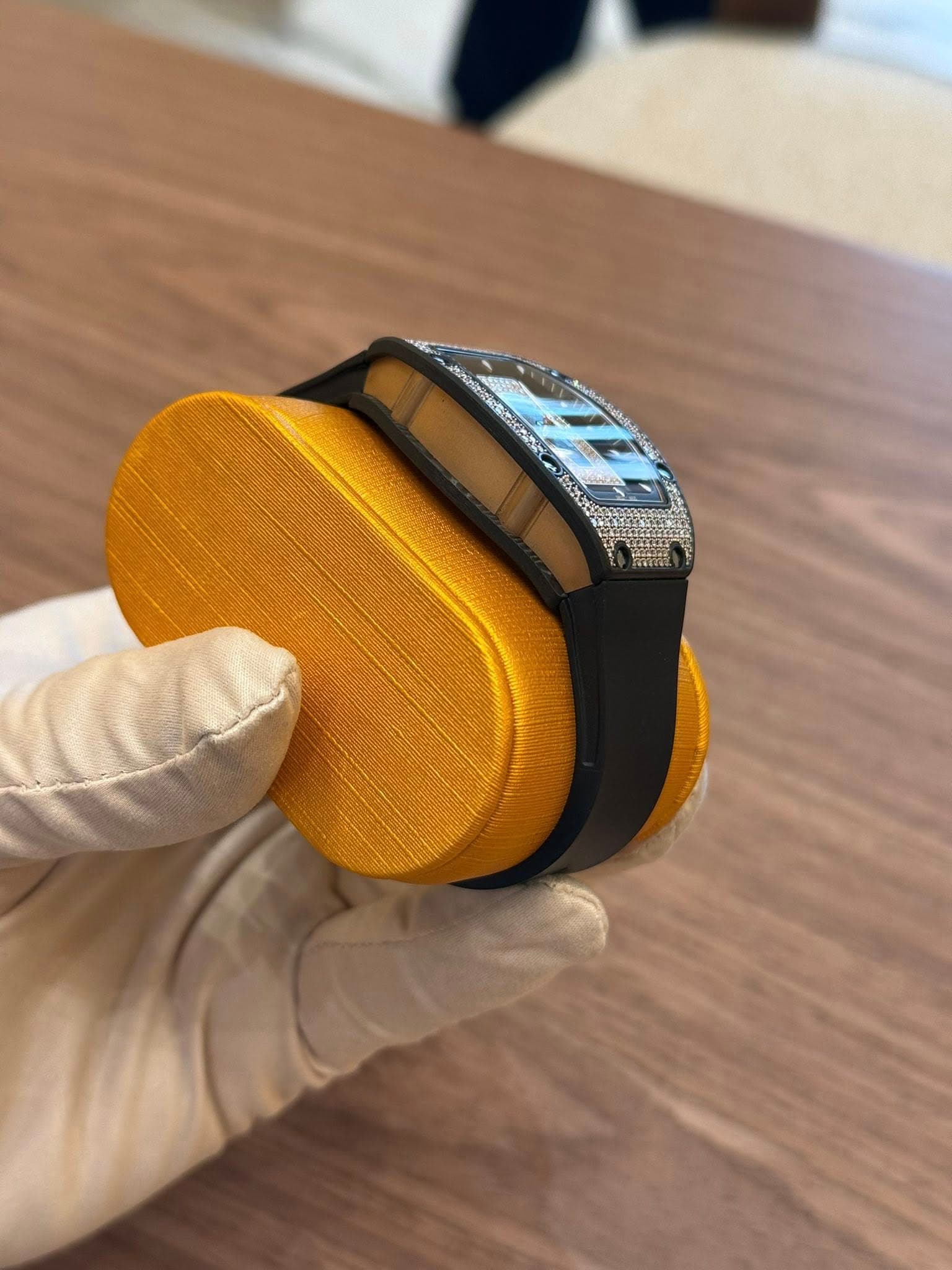May be an image of digital watch, phone and text