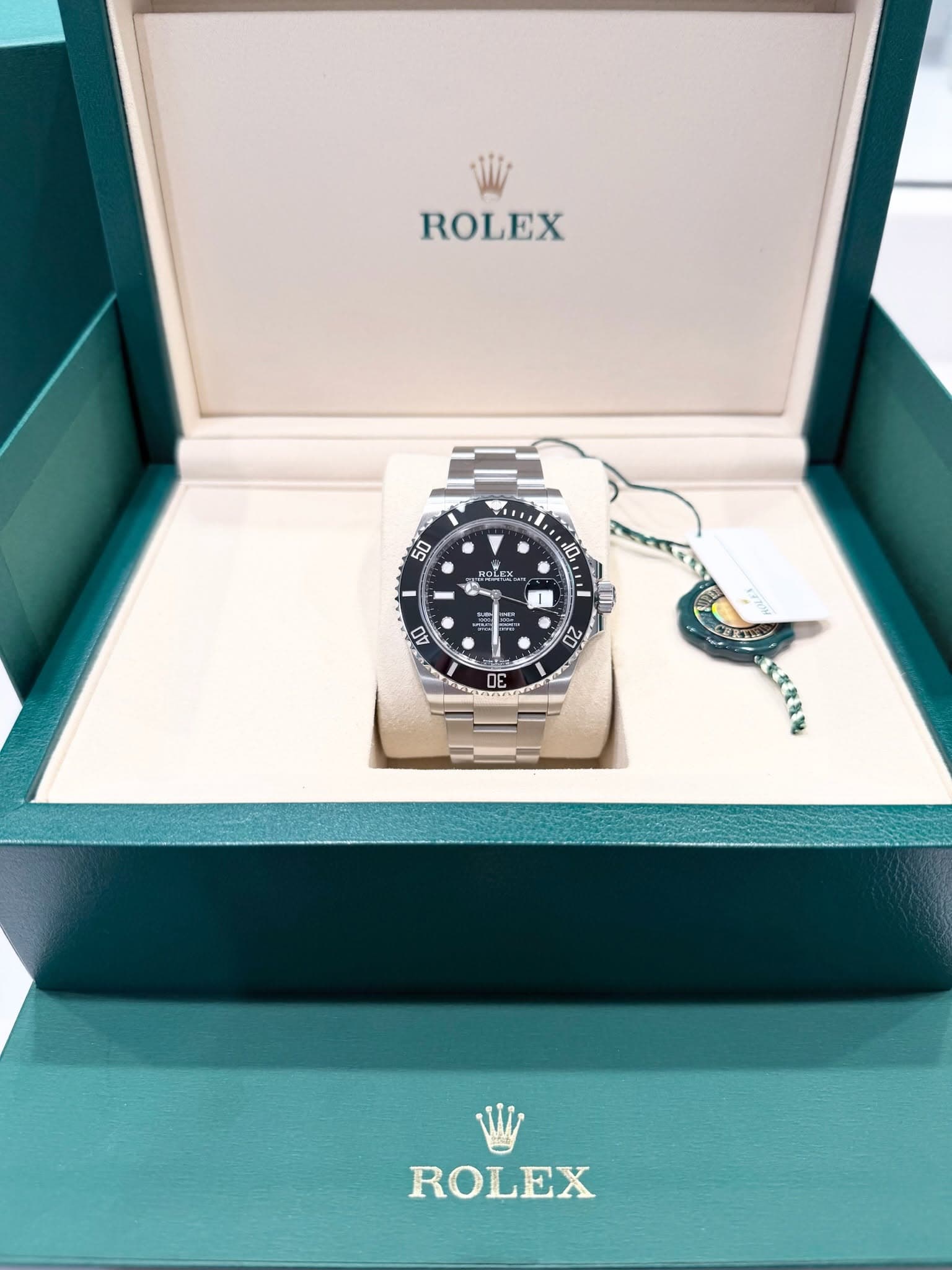 May be an image of wrist watch and text that says 'ROLEX 50 Bcx + l 福 AO 40 DE E R ROLEX'