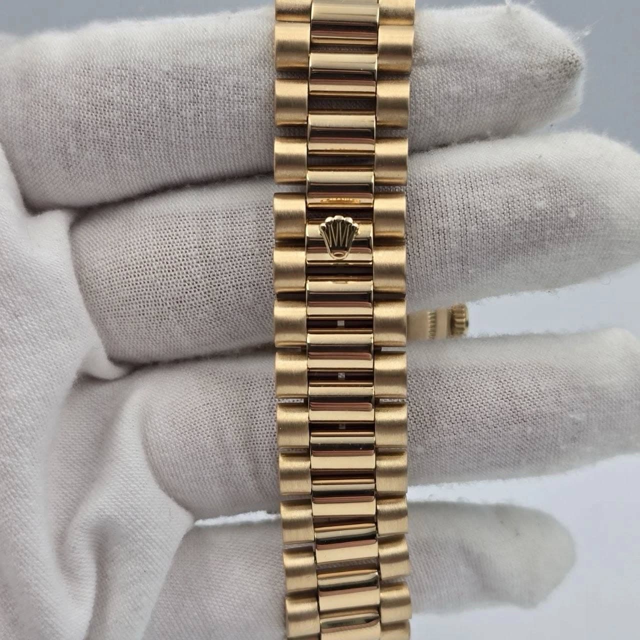 May be an image of wrist watch