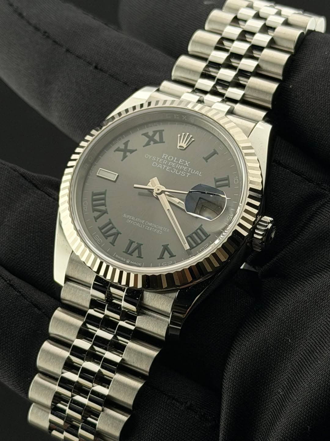 May be an image of wrist watch and text that says 'X XXI XI W OYSTROLEX DATEJUST ERPERPETUAL EX YSTERP ROLEX I I DAT EJUST ETUAL II 10 1001 WA SUPERLATIVE DEFICIALLY CTEA TER 150…