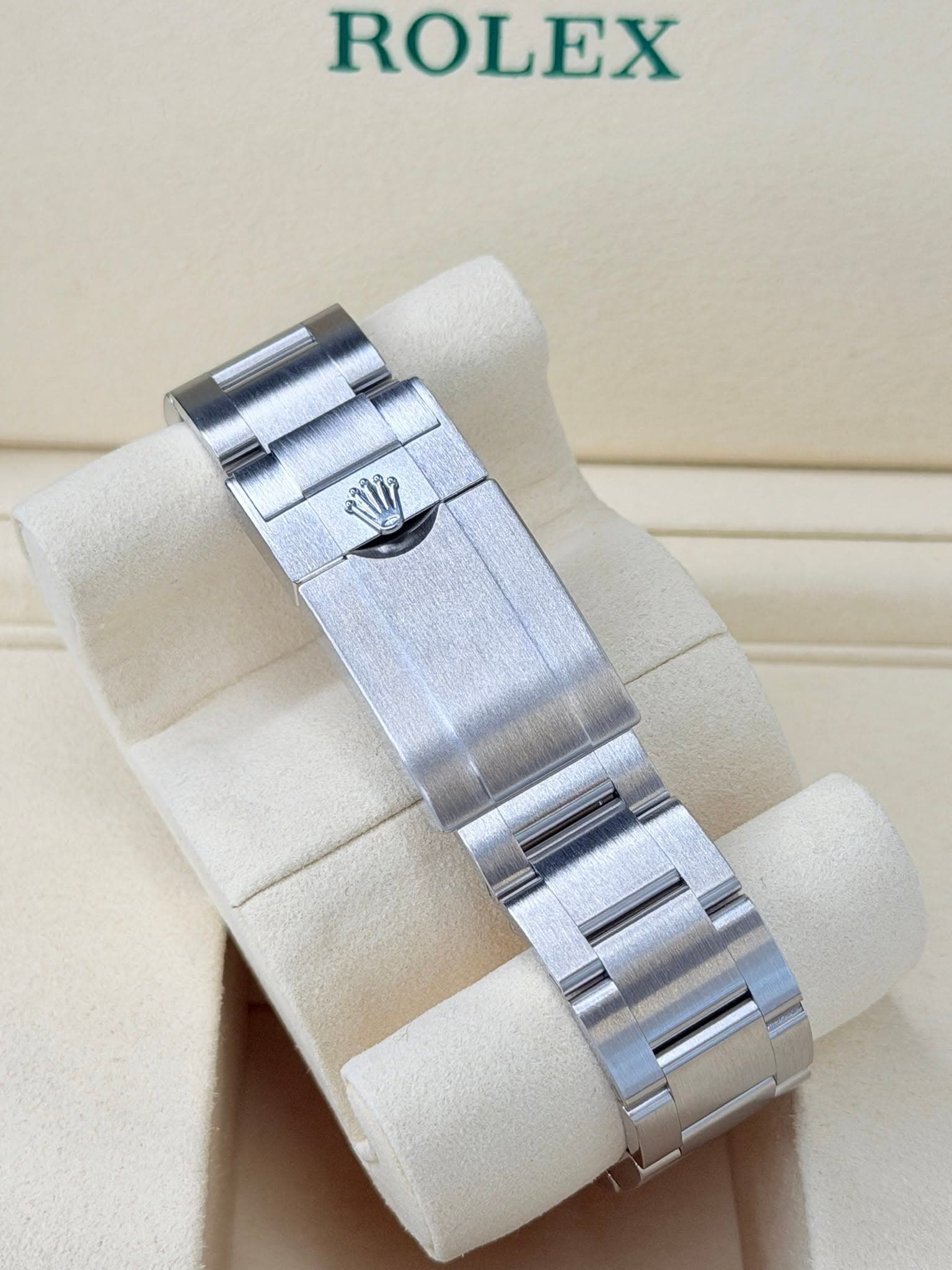 May be an image of wrist watch and text