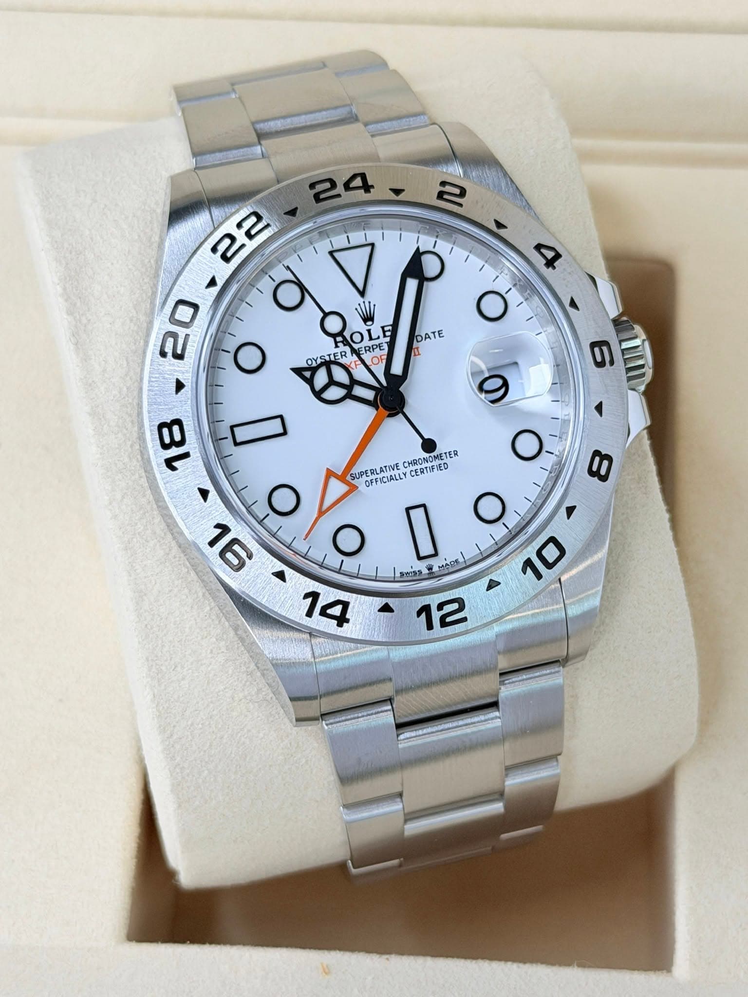 May be an image of wrist watch and text